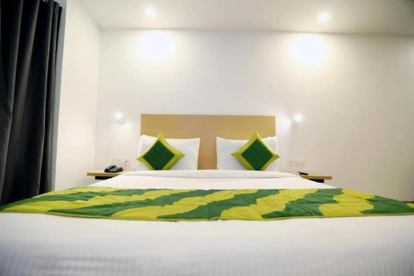 Bed in The Roseman Hotel & Suites