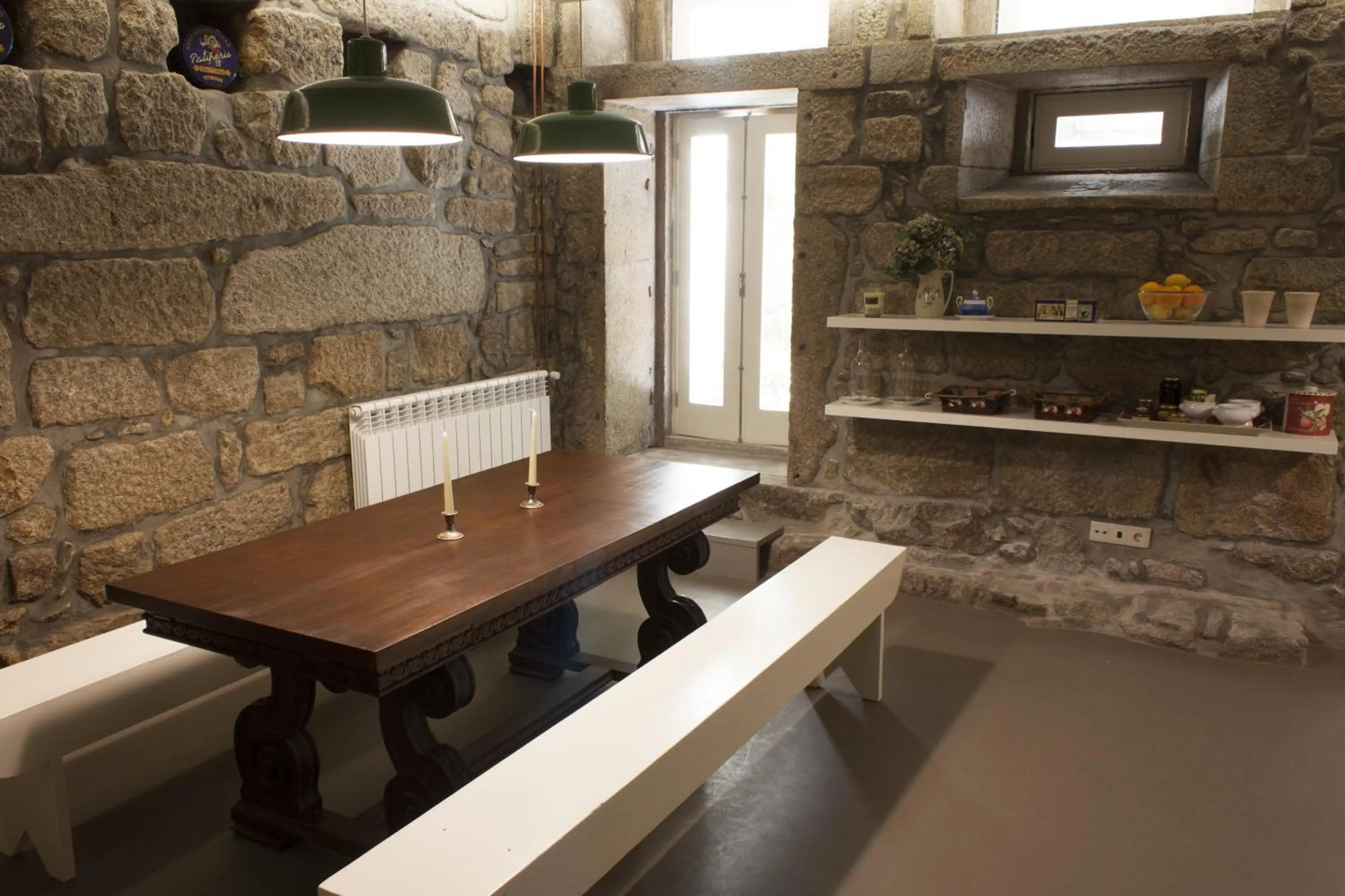 Communal kitchen in Being Porto Hostel