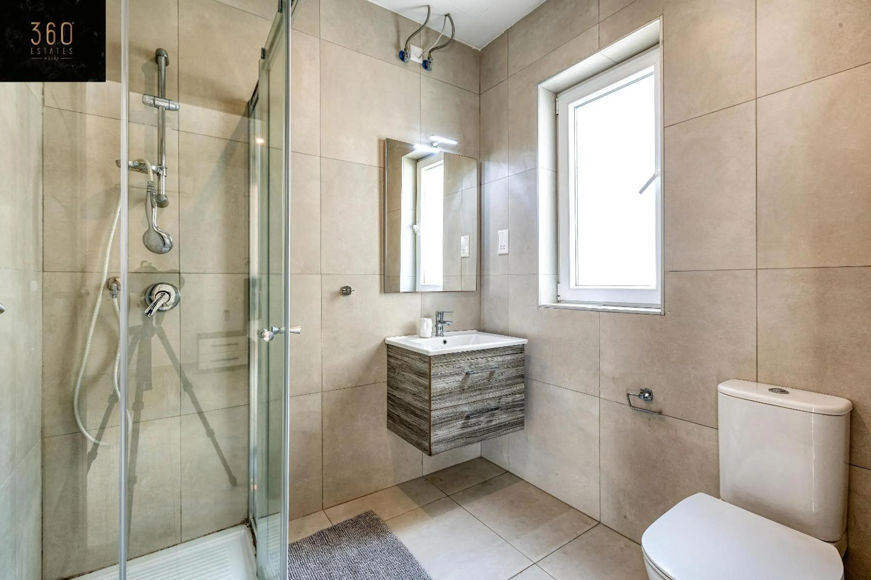 Shower in Stunning 2BR penthouse with harbour view & BBQ by 360 Estates