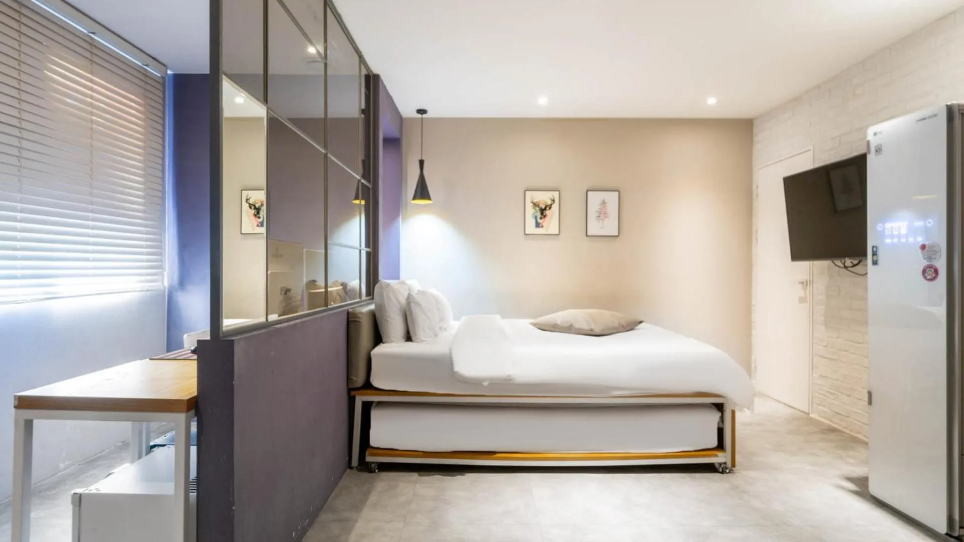 Photo of the whole room, Bed in NU Hotel