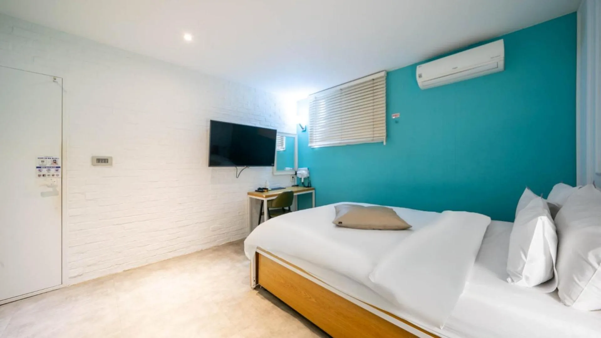 Photo of the whole room, Bed in NU Hotel