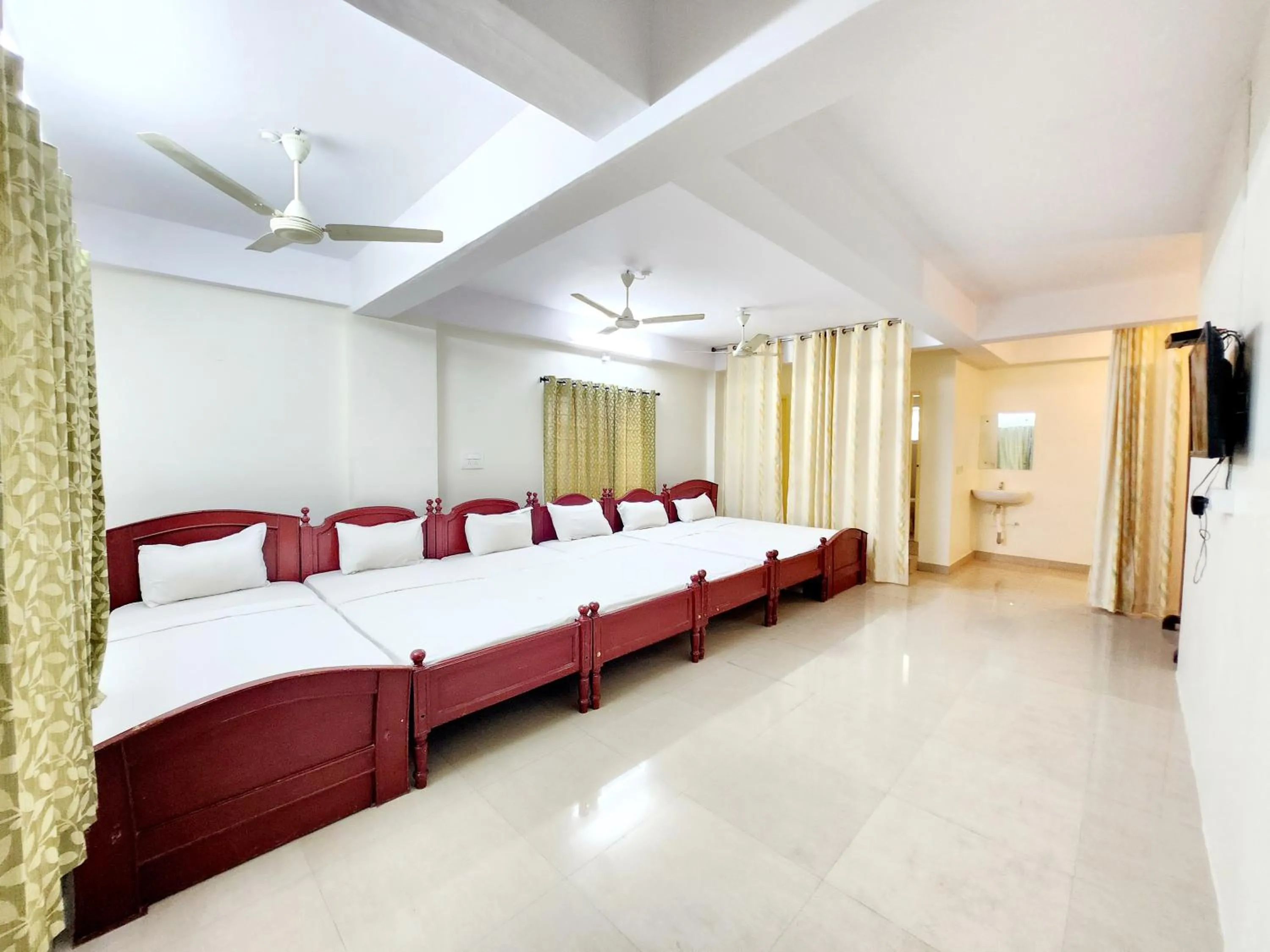 Bed in Suvarna Residency