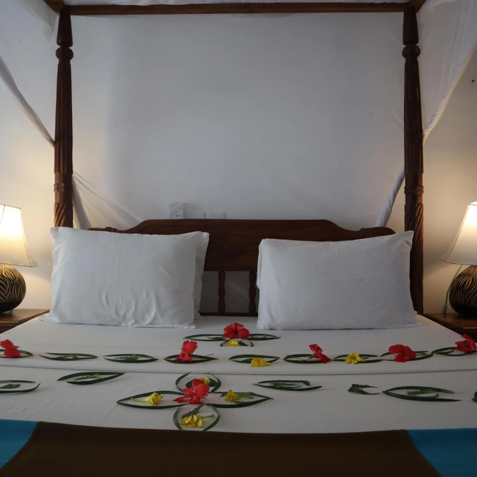 Bed in Lily Palm Resort