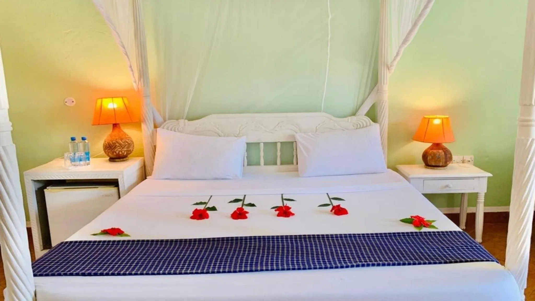 Bed in Lily Palm Resort