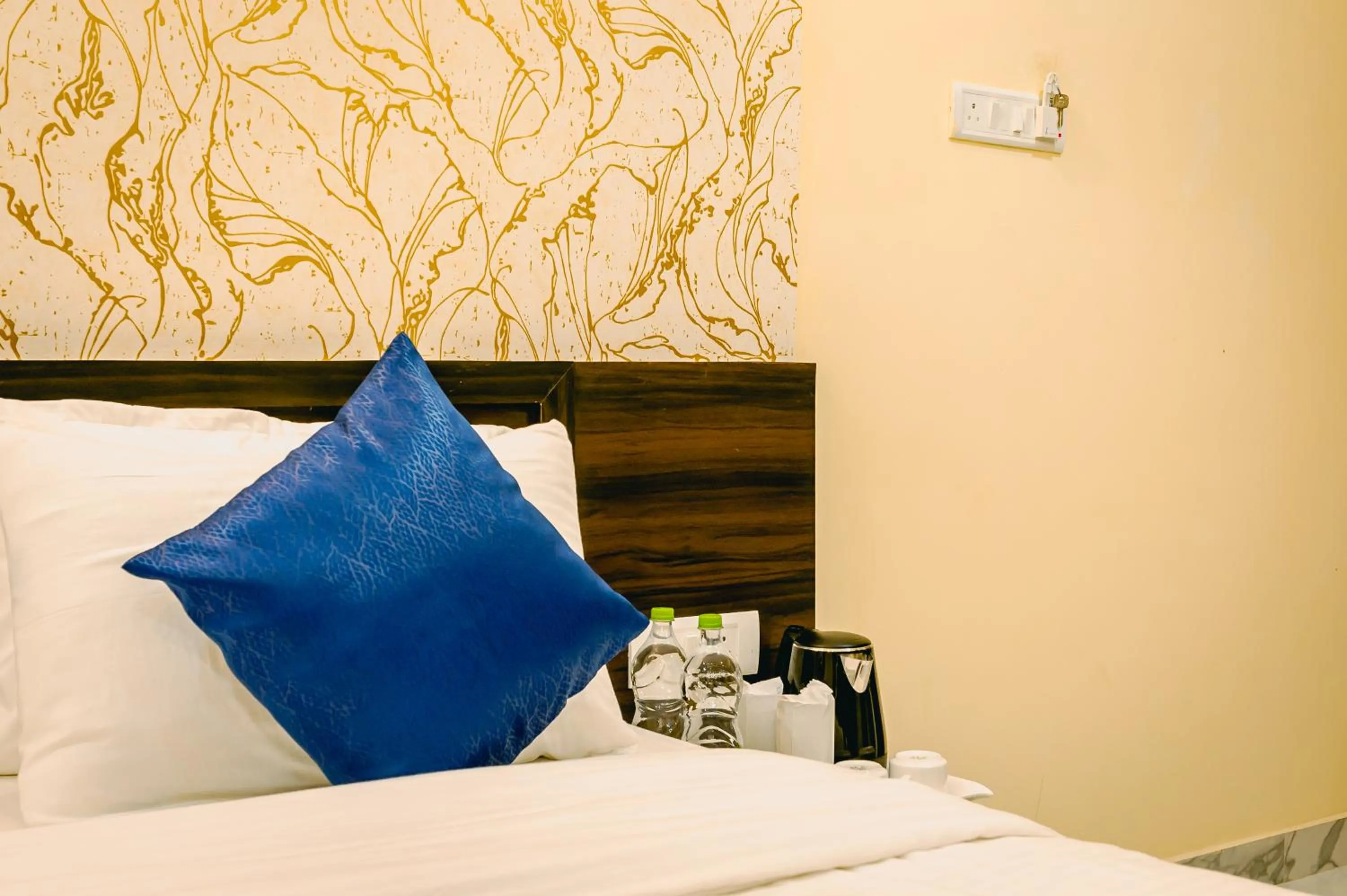 Bed in Livotel Premium Hotel