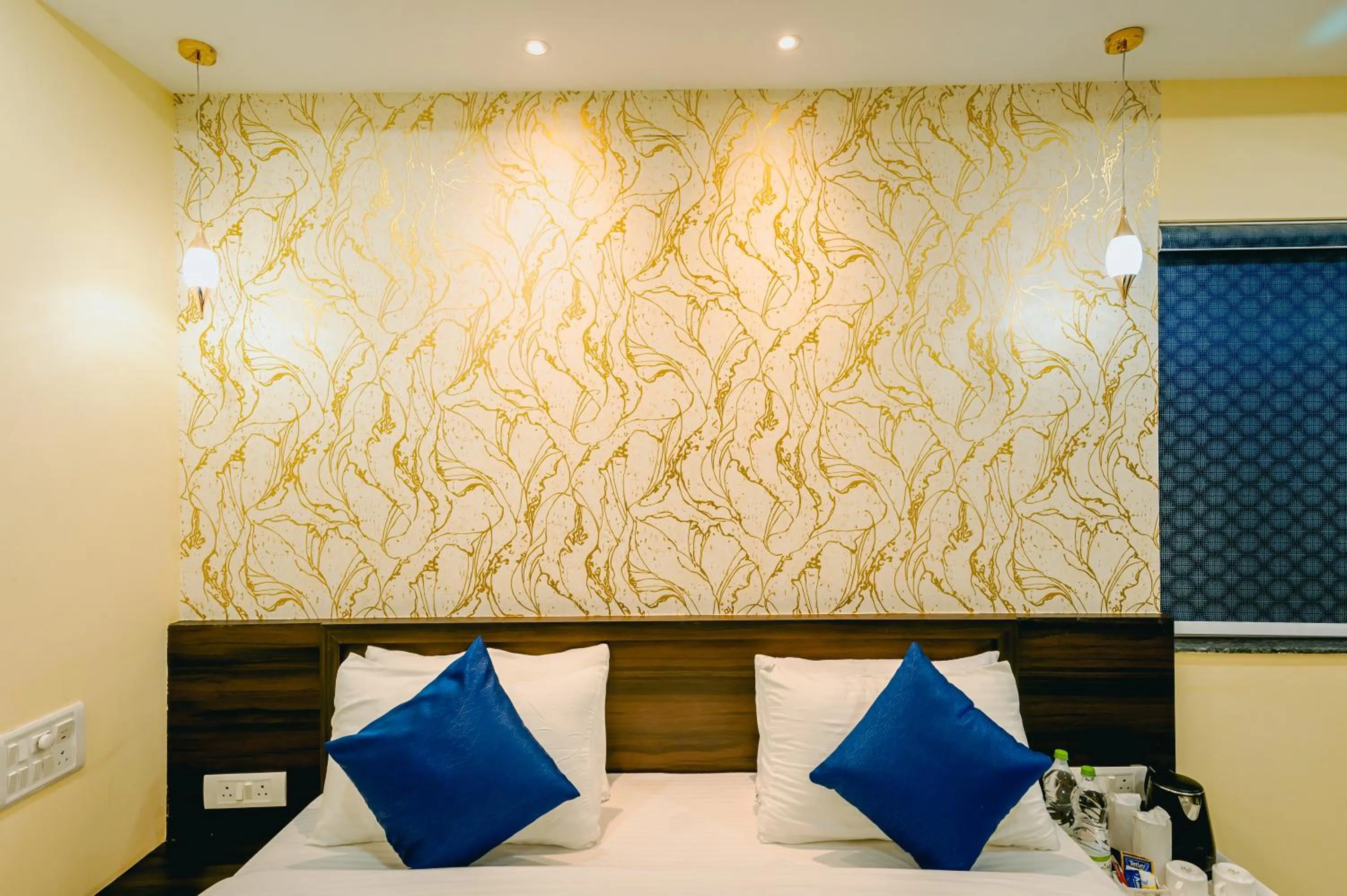 Bed in Livotel Premium Hotel