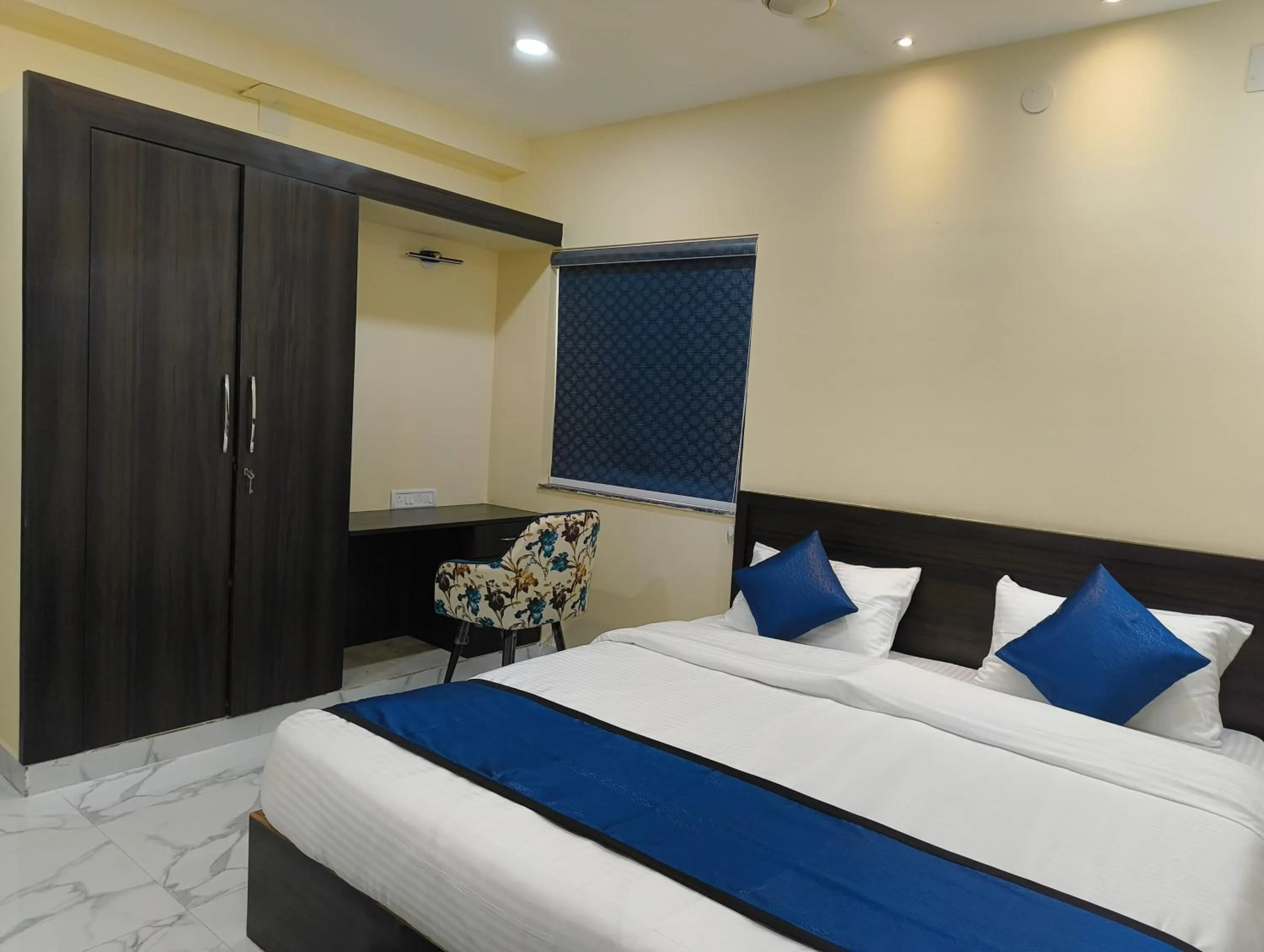 Bed in Livotel Premium Hotel