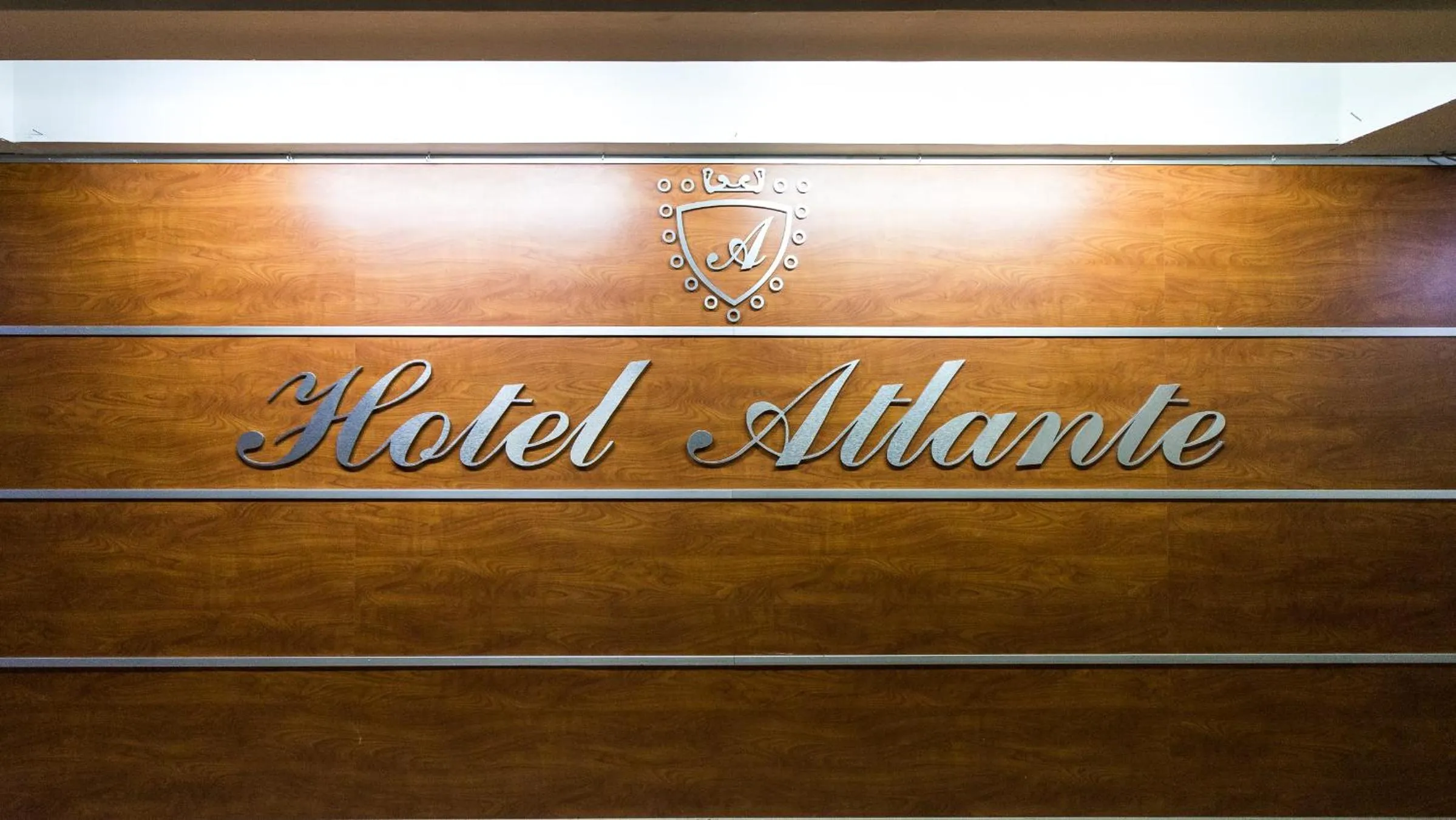 Property logo or sign in Hotel Atlante