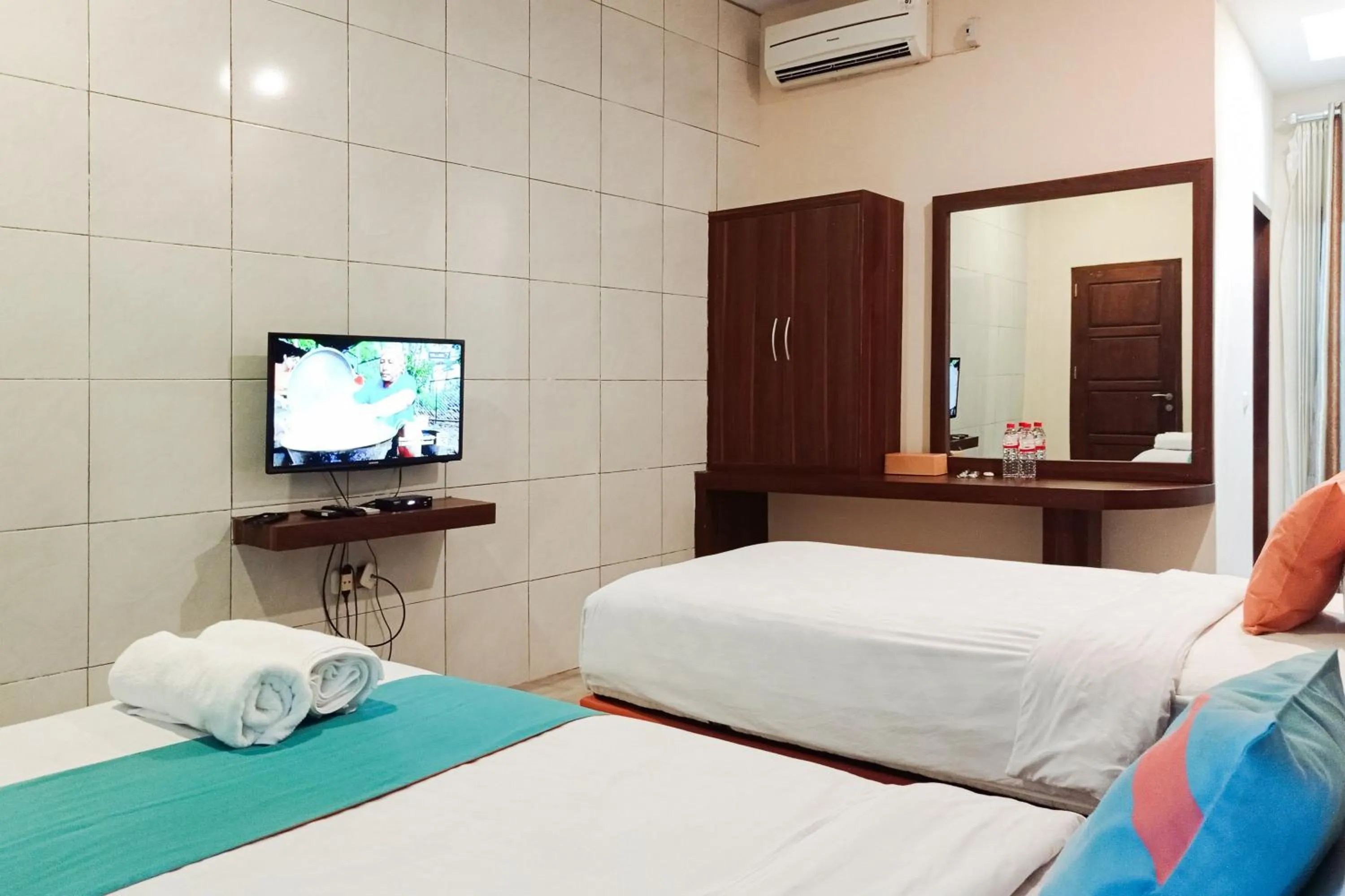 Bedroom, Bed in Sans Hotel Grand Jitra Syariah Bengkulu