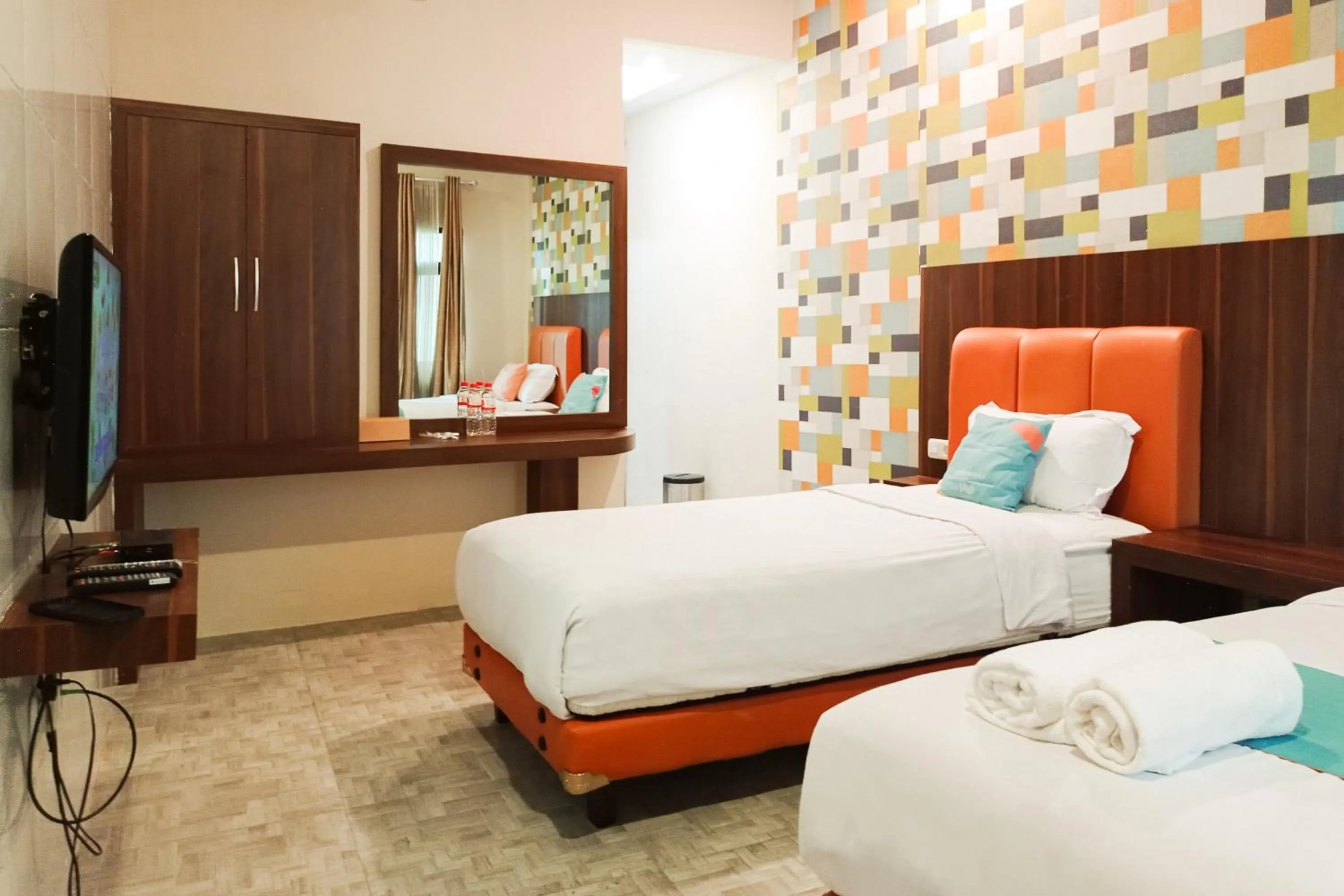 Bedroom, Bed in Sans Hotel Grand Jitra Syariah Bengkulu