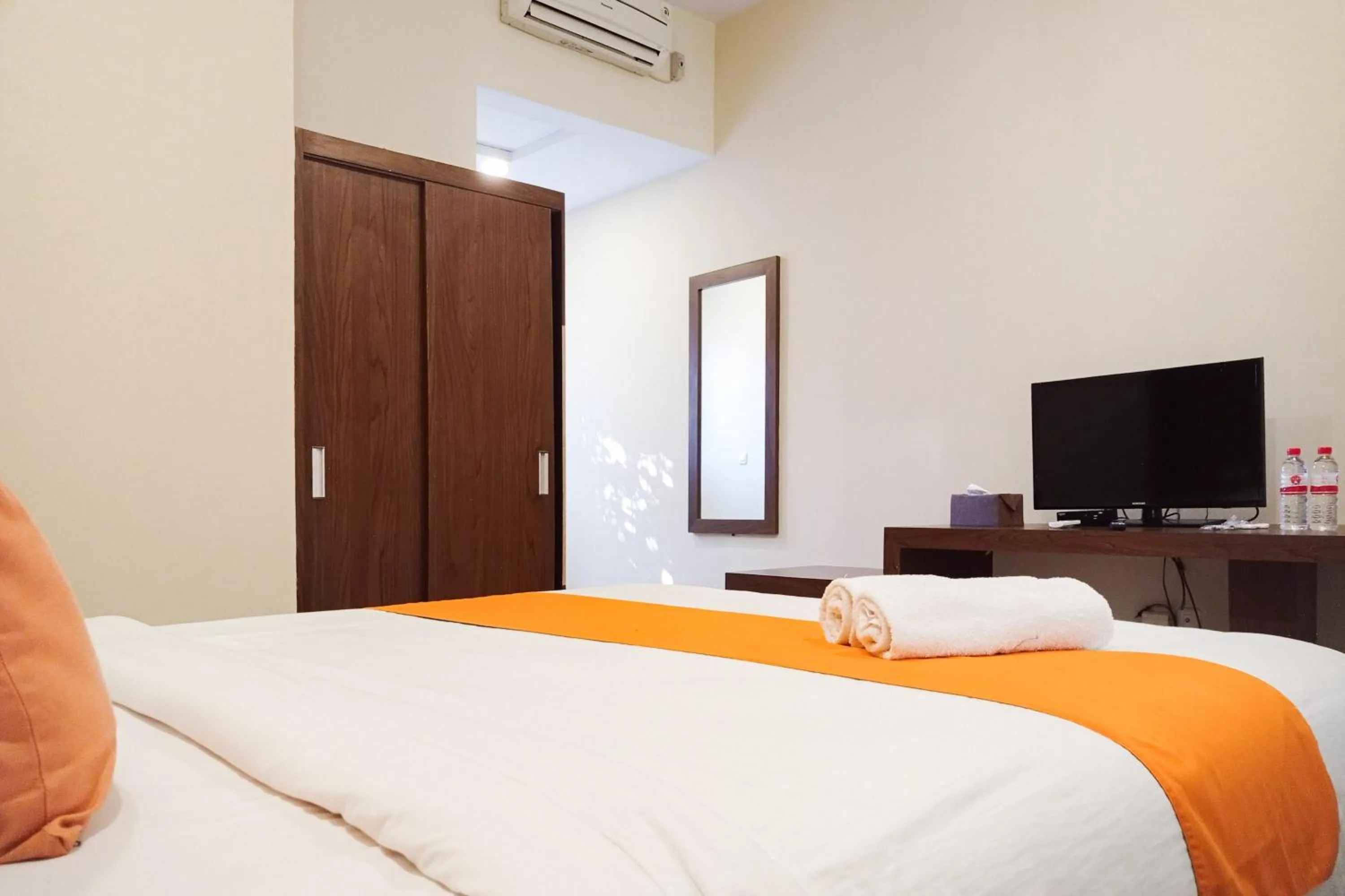 Bedroom, Bed in Sans Hotel Grand Jitra Syariah Bengkulu