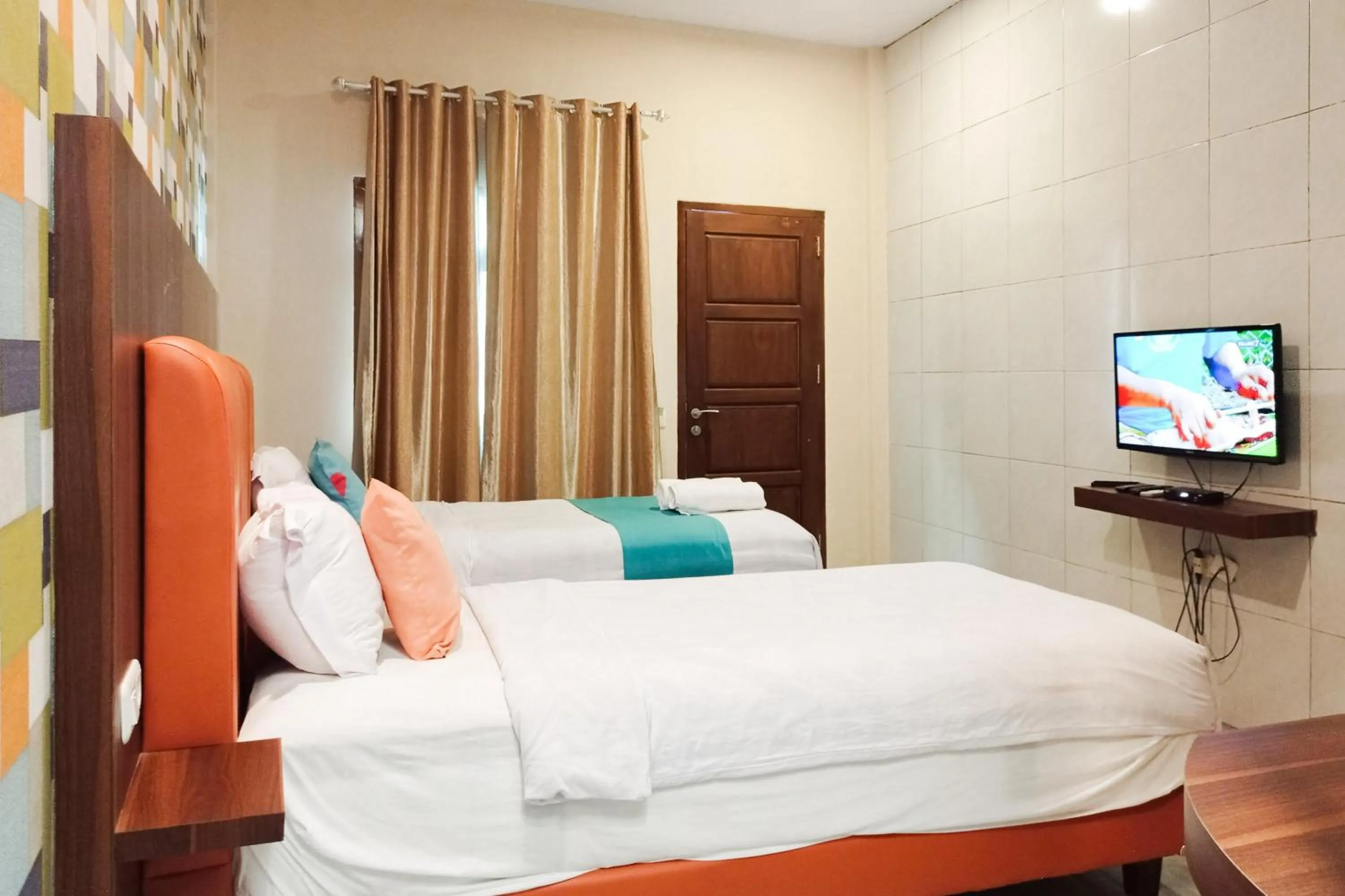 Bedroom, Bed in Sans Hotel Grand Jitra Syariah Bengkulu
