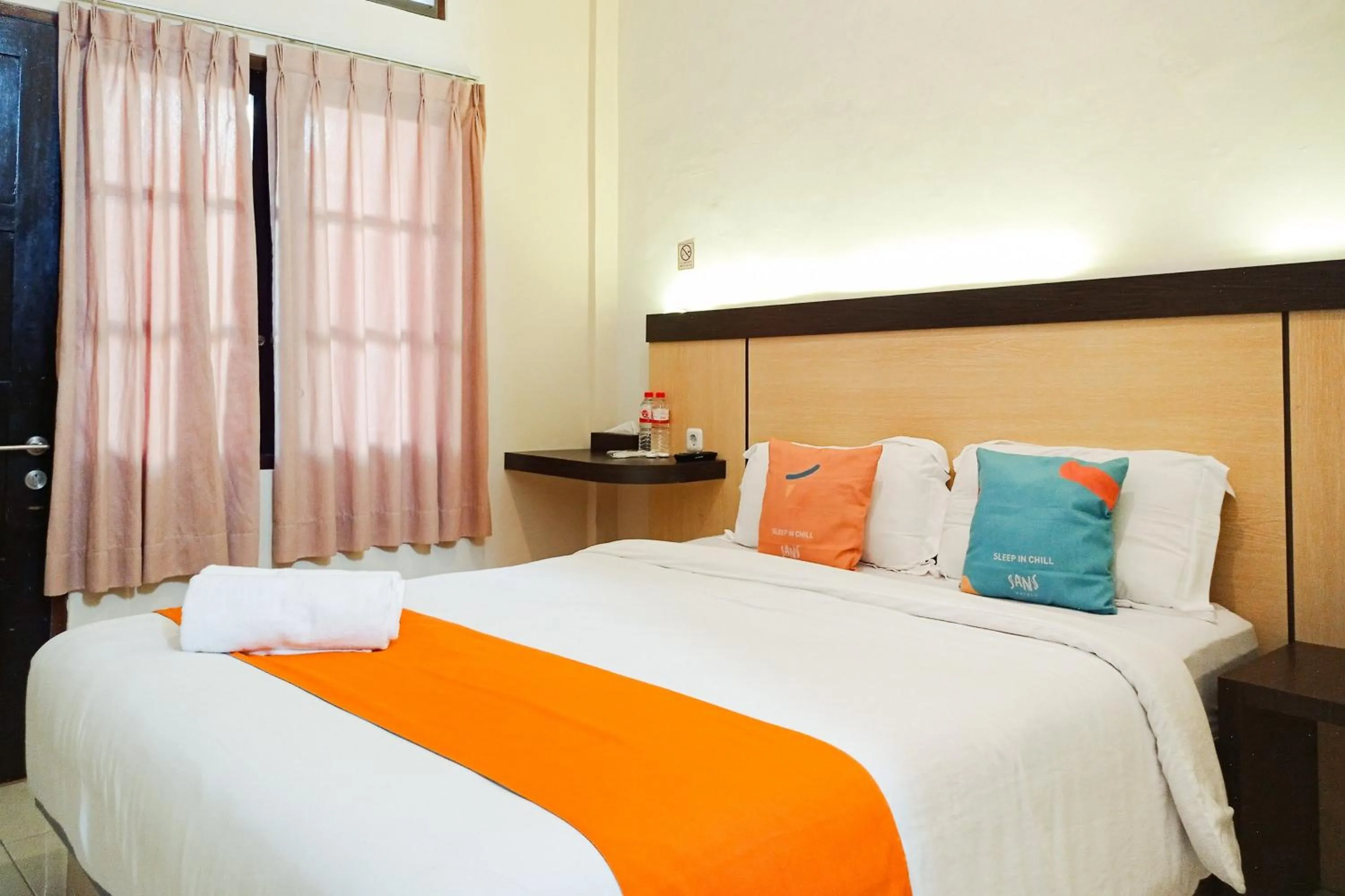 Bedroom, Bed in Sans Hotel Grand Jitra Syariah Bengkulu