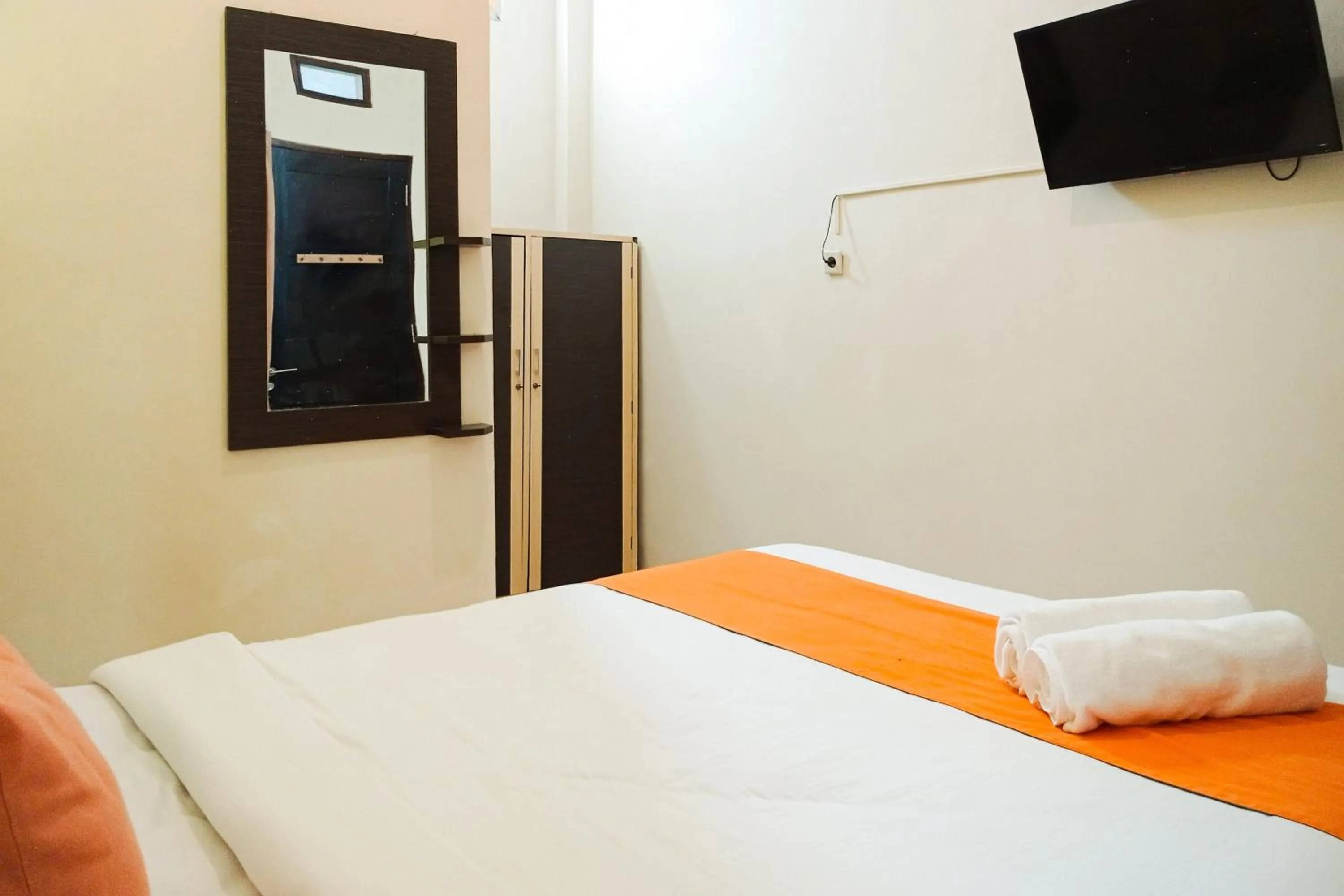 Bedroom, Bed in Sans Hotel Grand Jitra Syariah Bengkulu