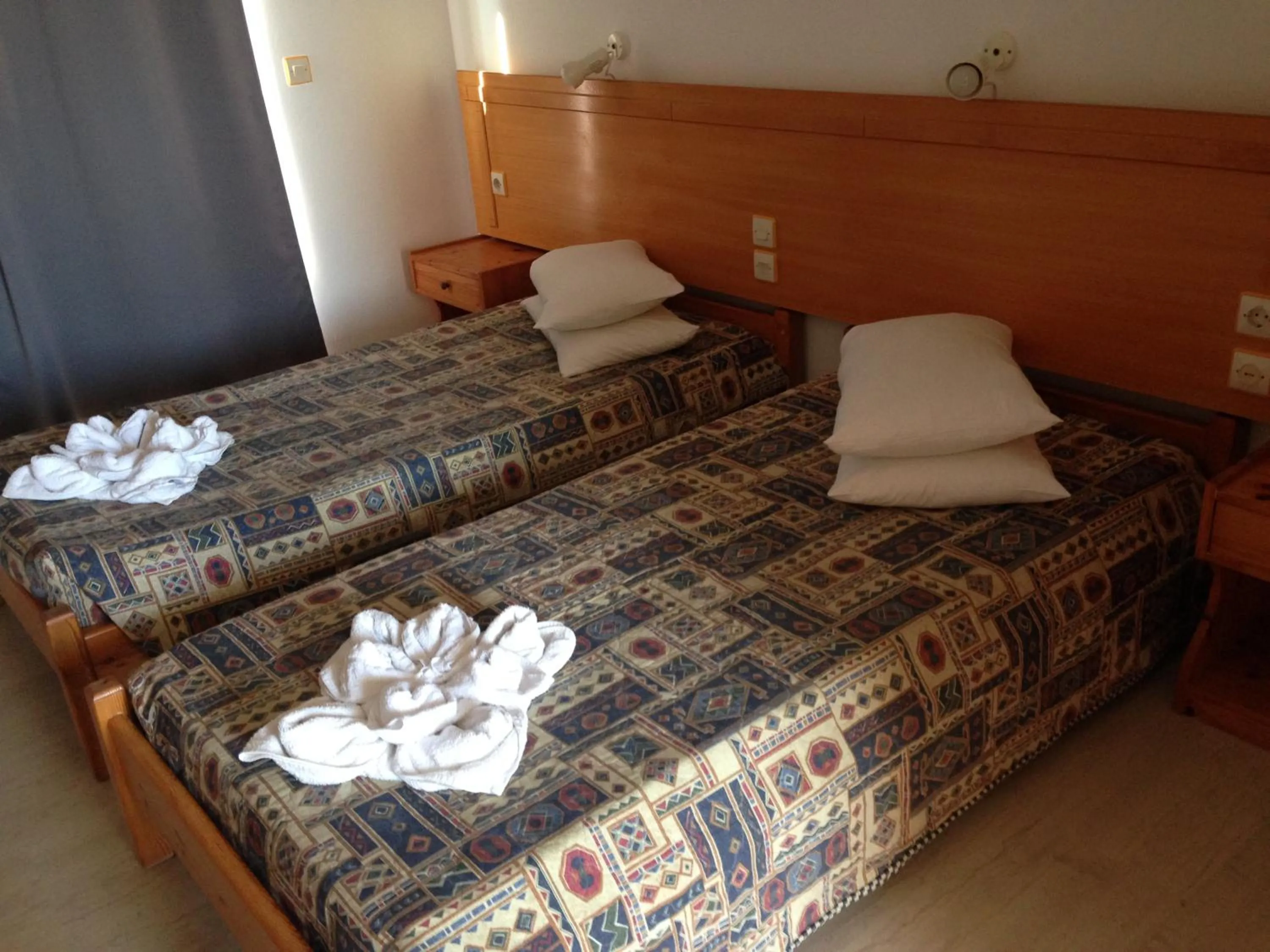 Bed in Pantheon Hotel