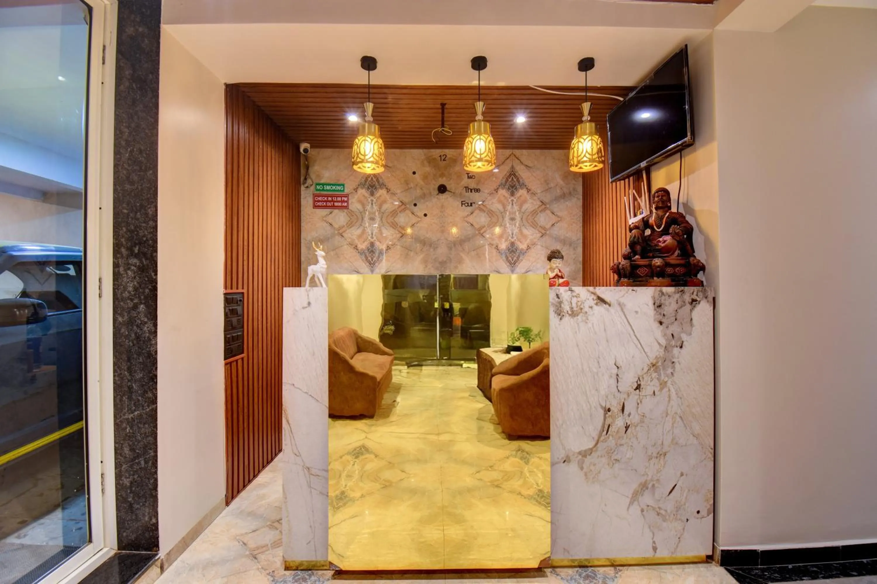 Lobby or reception in Holiday Plus