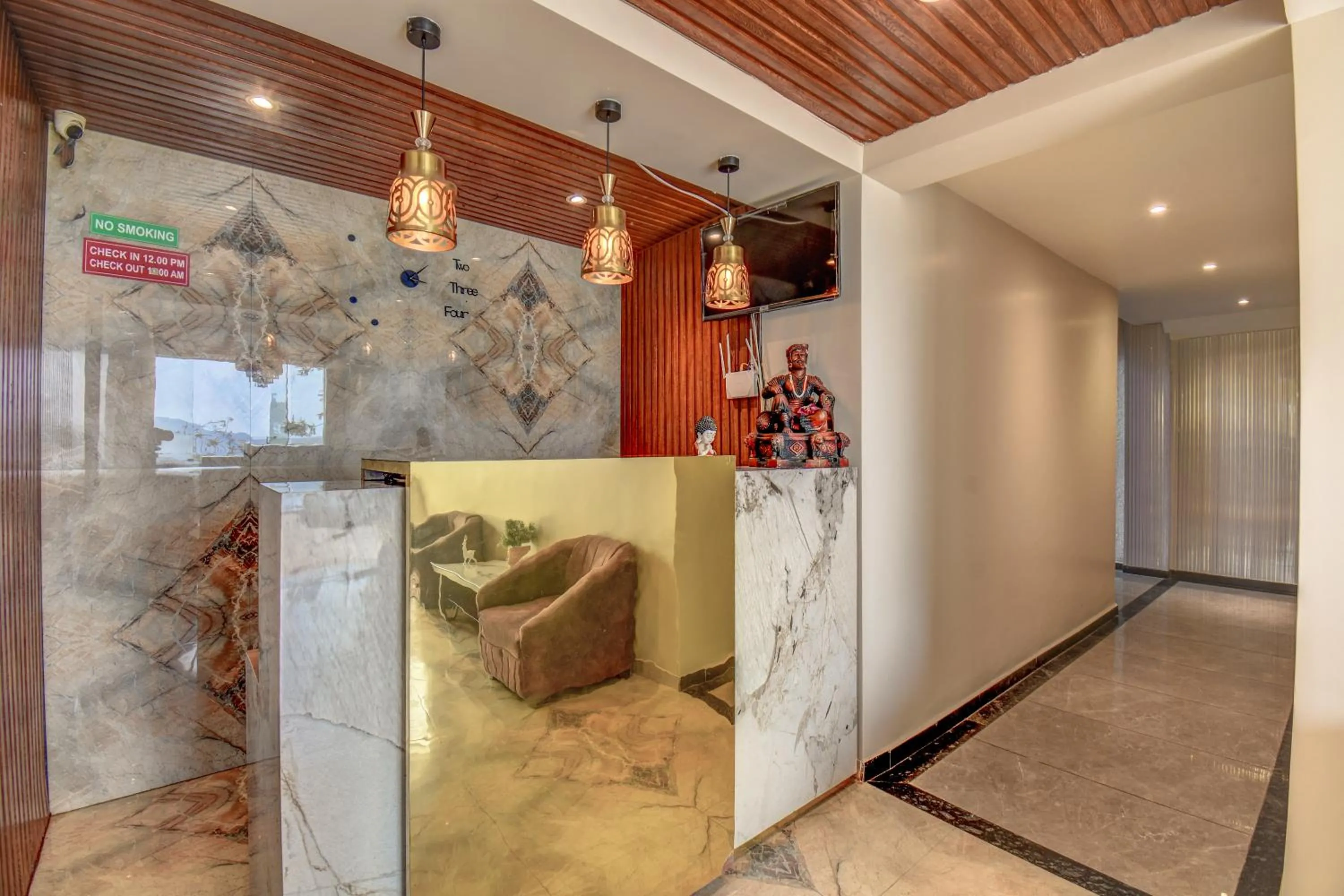 Lobby or reception in Holiday Plus
