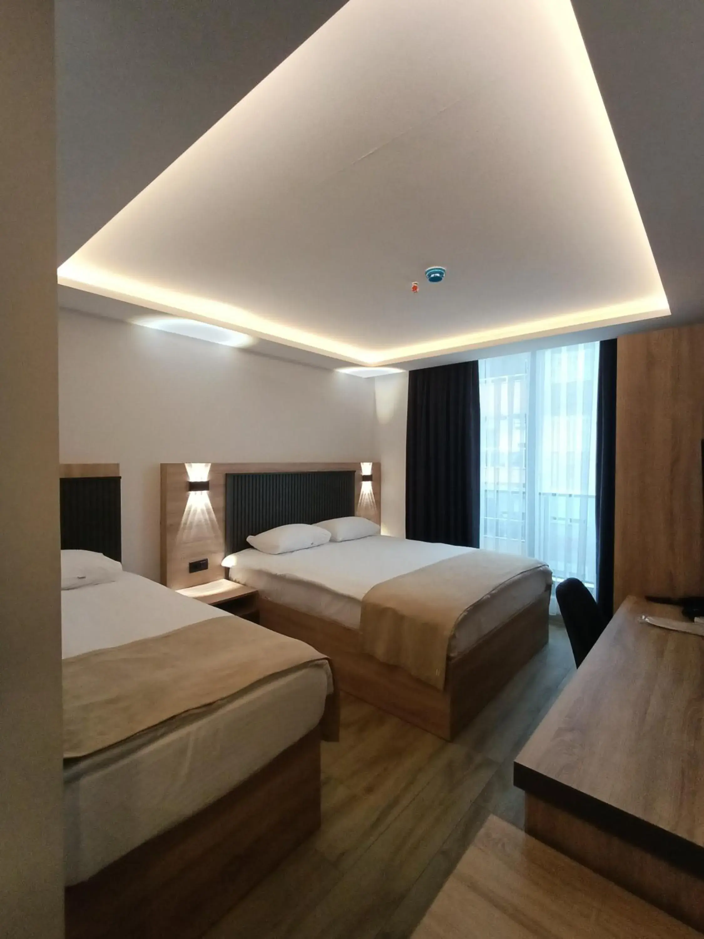 Deluxe Triple Room in Döşemealtı Konfor Hotel Deluxe Triple Room in Döşemealtı Konfor Hotel