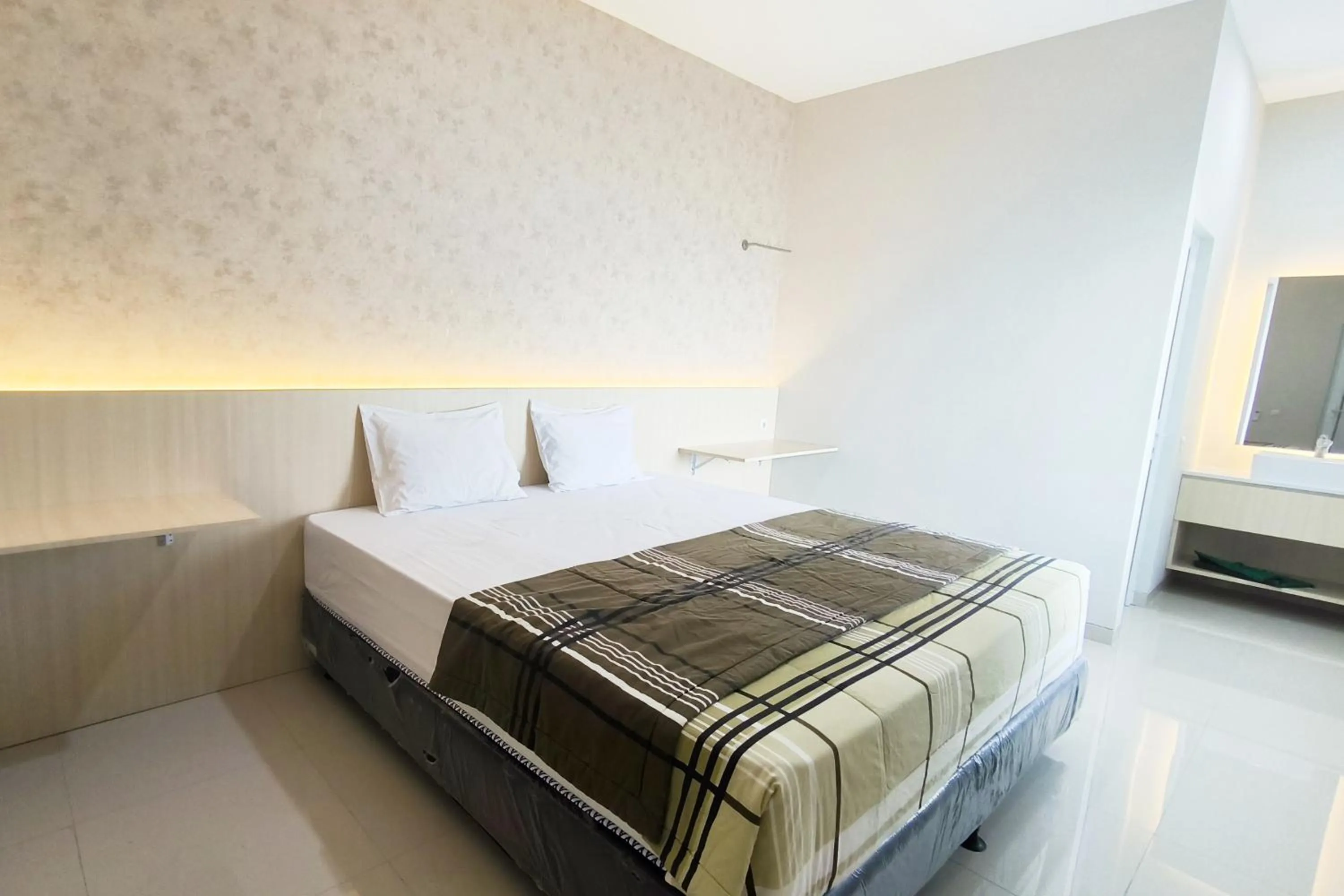 Bed in Tumesa Guesthouse Syariah 2