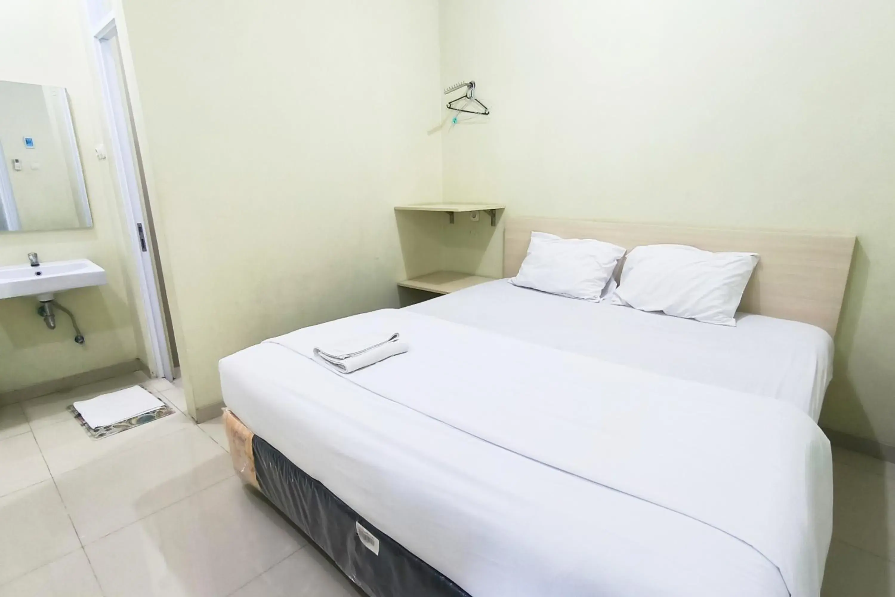 Bed in Tumesa Guesthouse Syariah 2 Bed in Tumesa Guesthouse Syariah 2