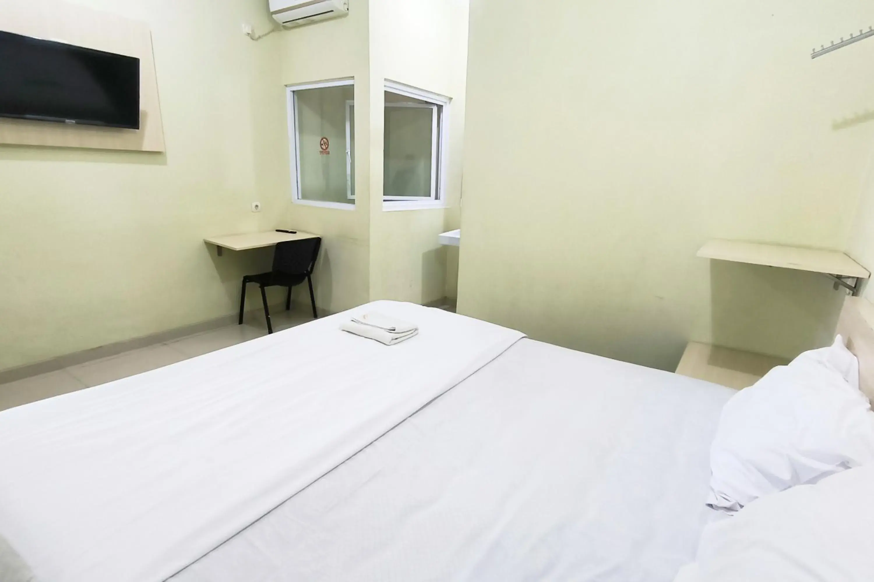 Bed in Tumesa Guesthouse Syariah 2 Bed in Tumesa Guesthouse Syariah 2