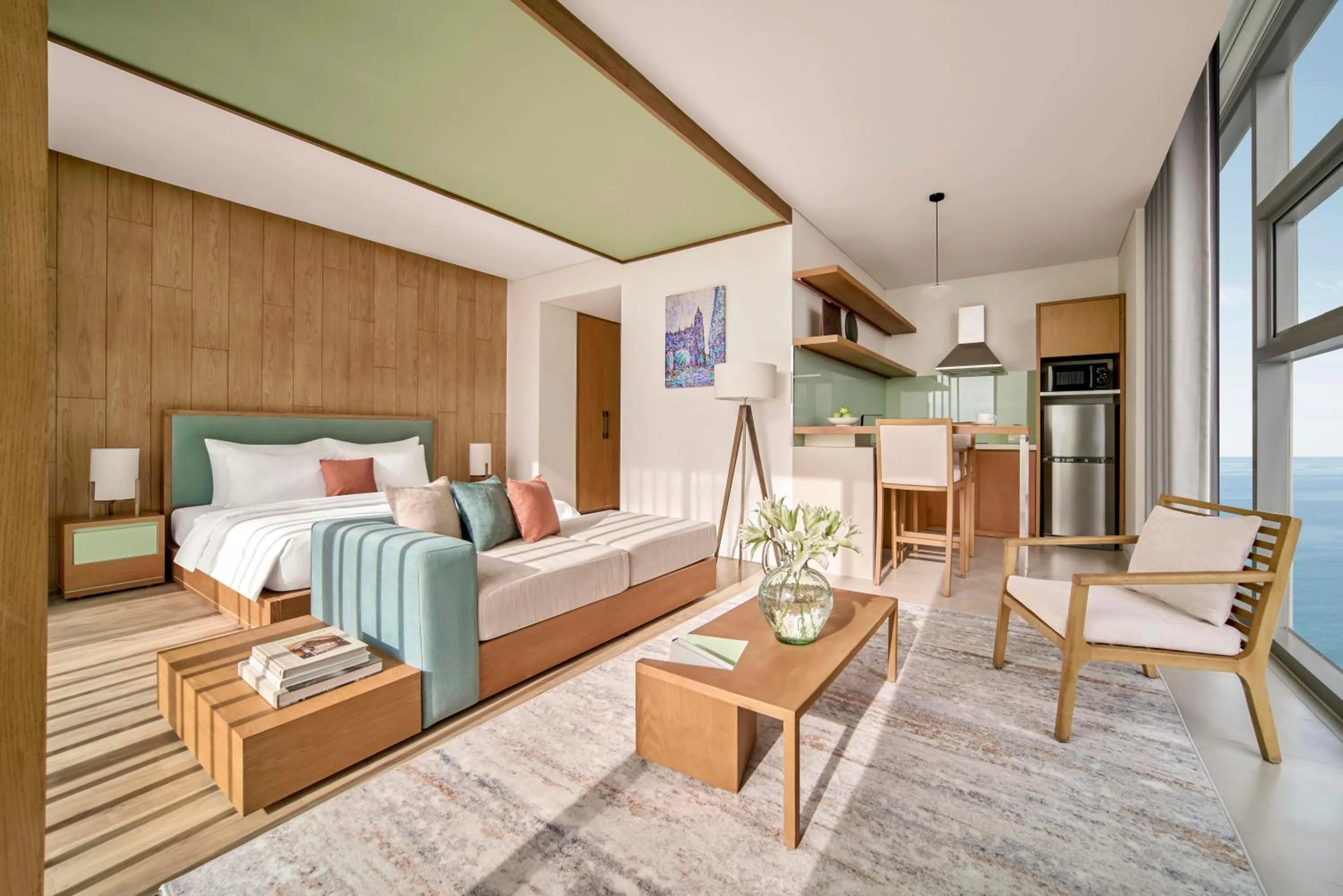 Living room, Bed in Signature by M Village Beachfront Hotel