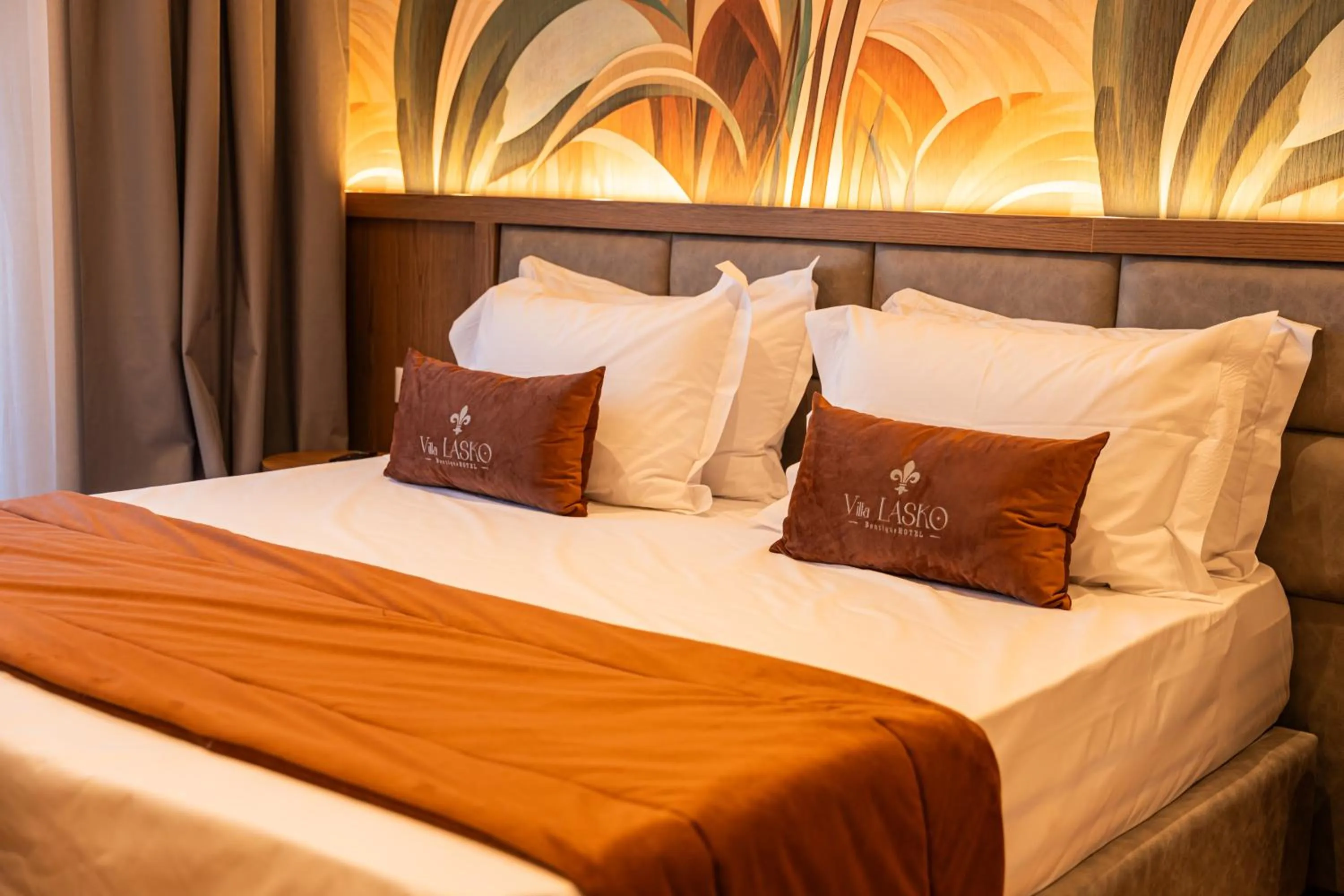 Bed in Vila Lasko Hotel