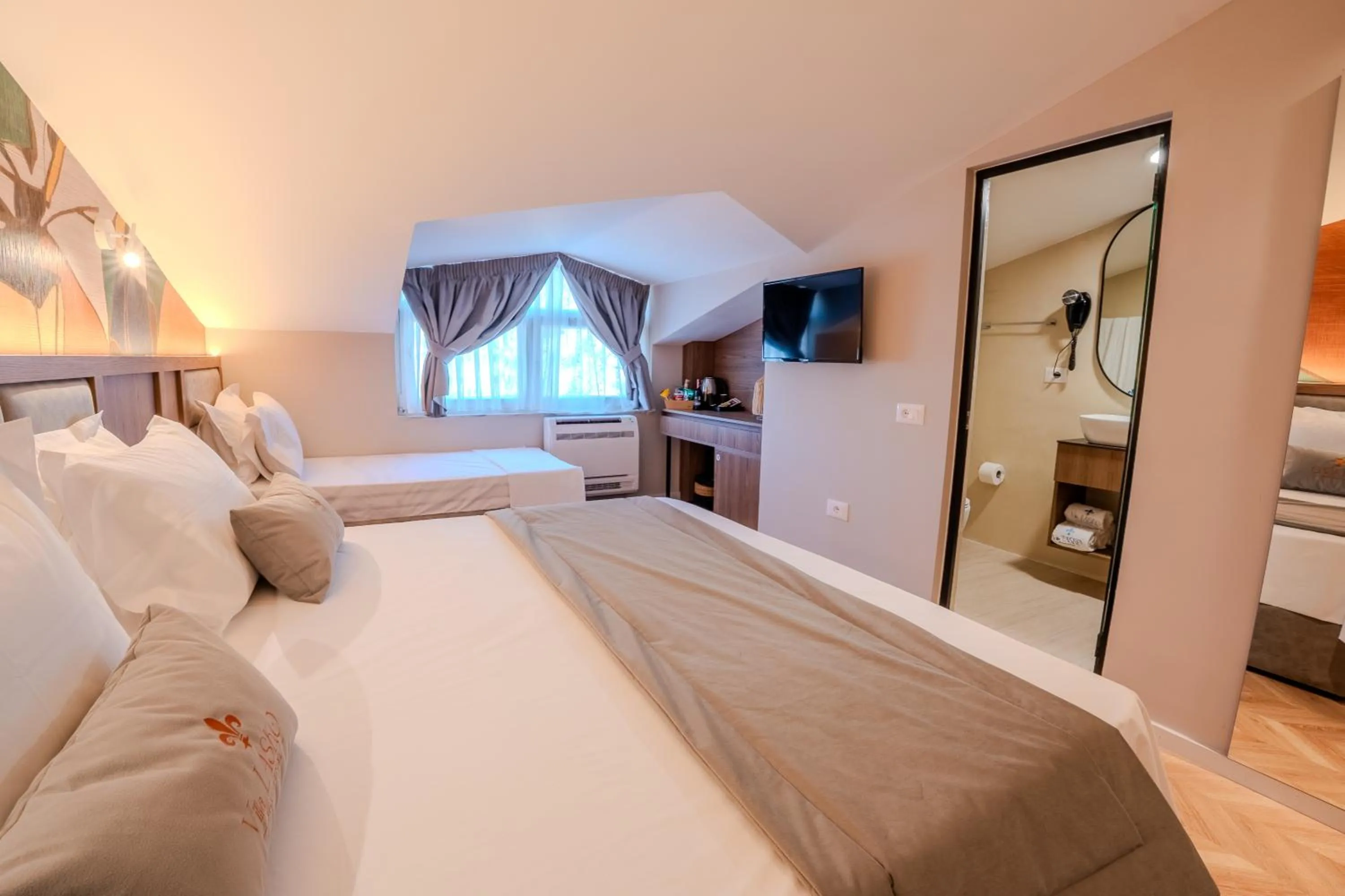 Bed in Vila Lasko Hotel