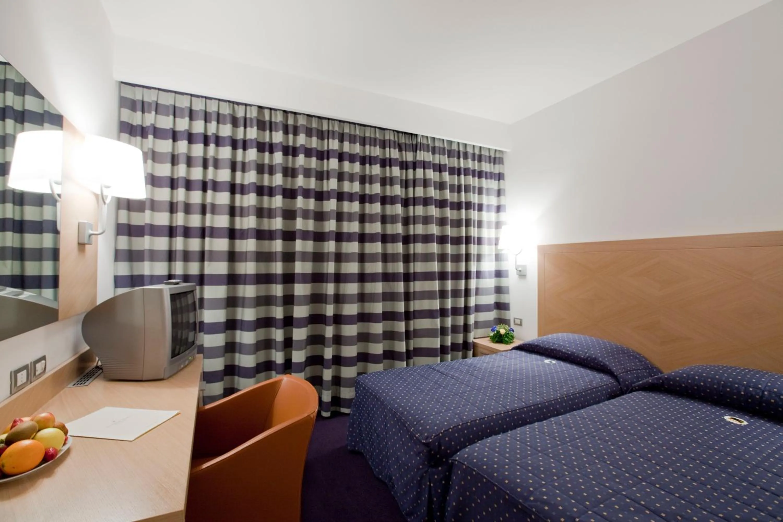 Bed in Centrum Palace Hotel & Resorts