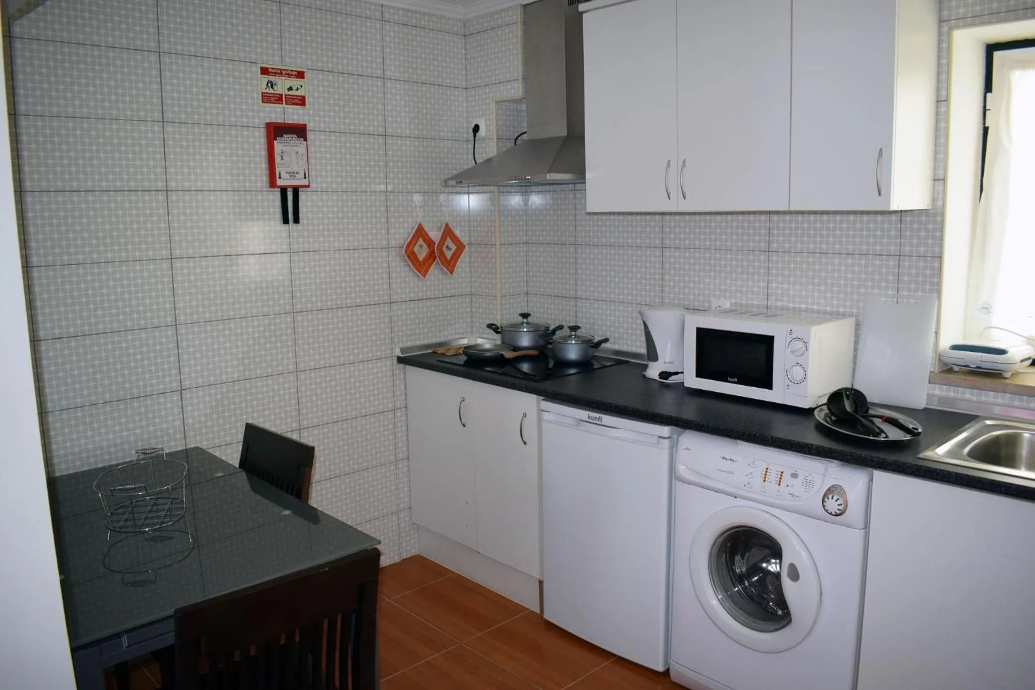 Kitchen or kitchenette in Residência Machado