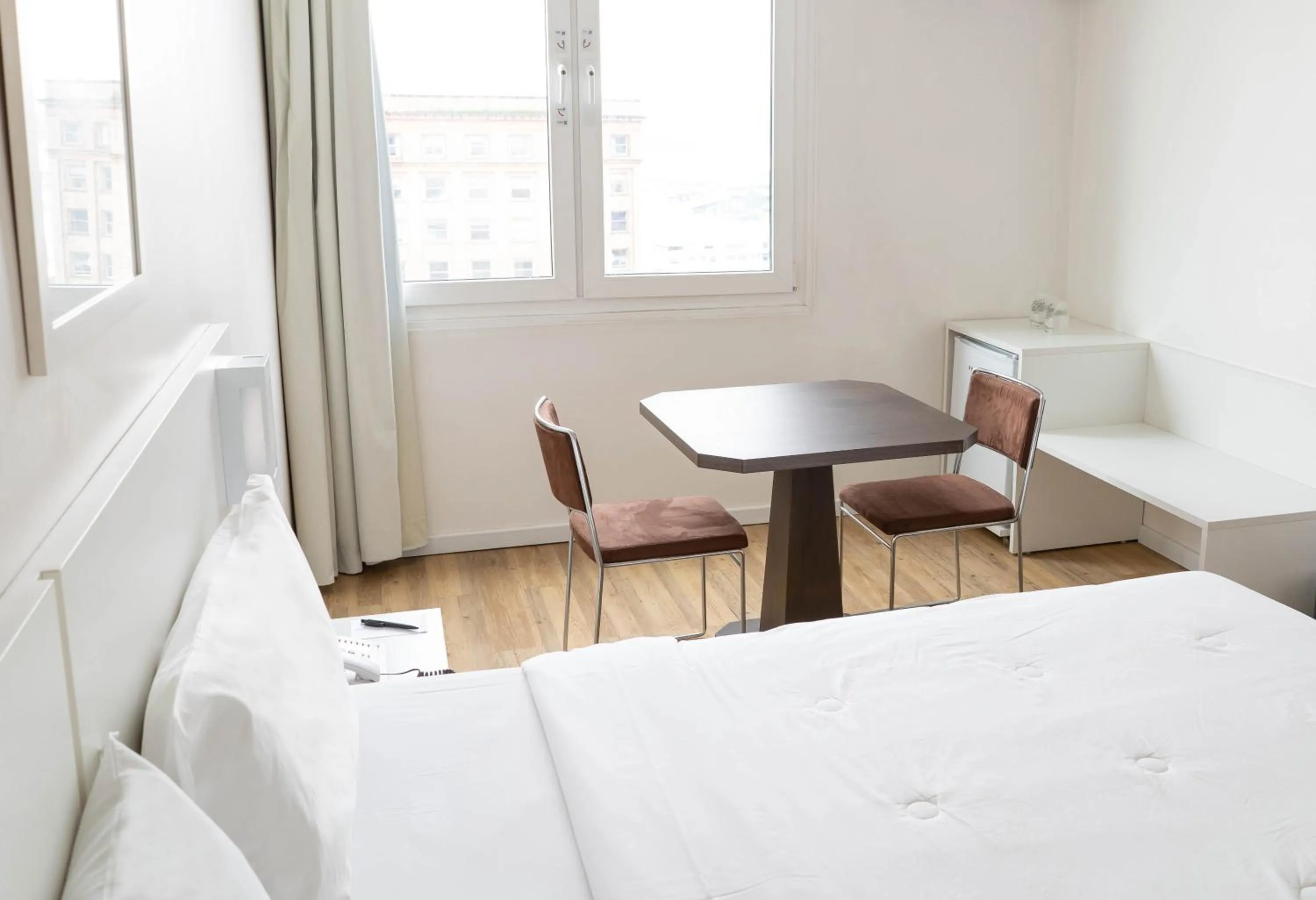 Bed in Plaza São Rafael Hotel