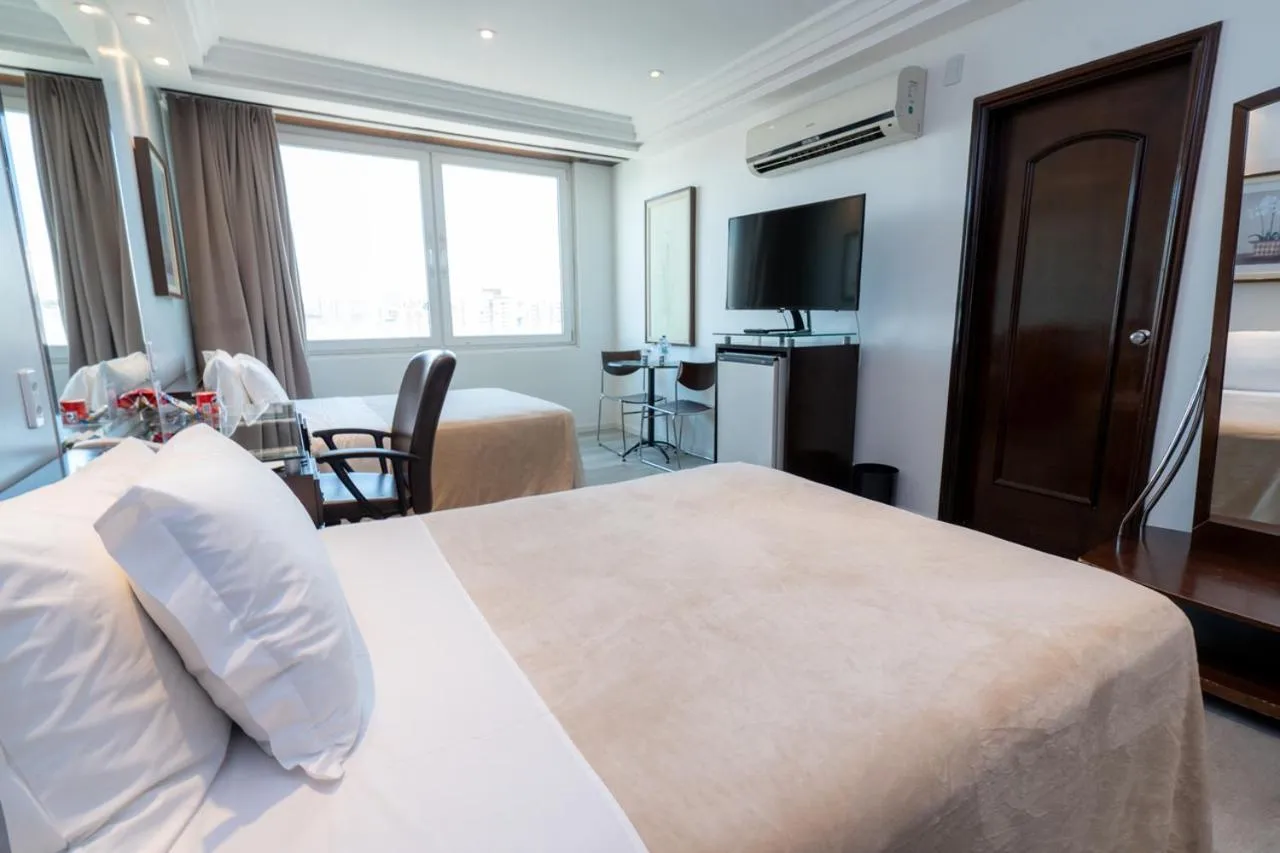 Bed in Plaza São Rafael Hotel