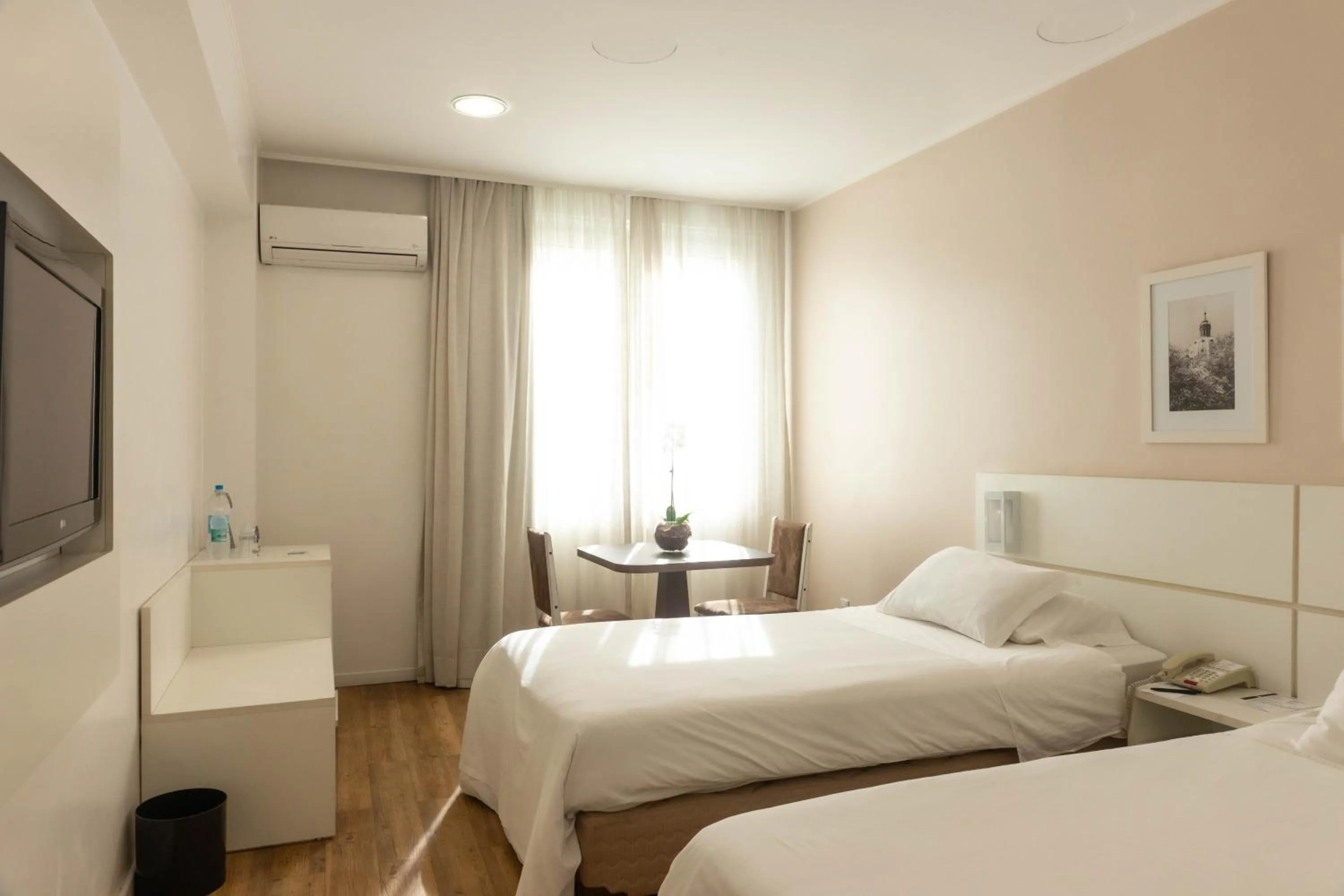 Bed in Plaza São Rafael Hotel