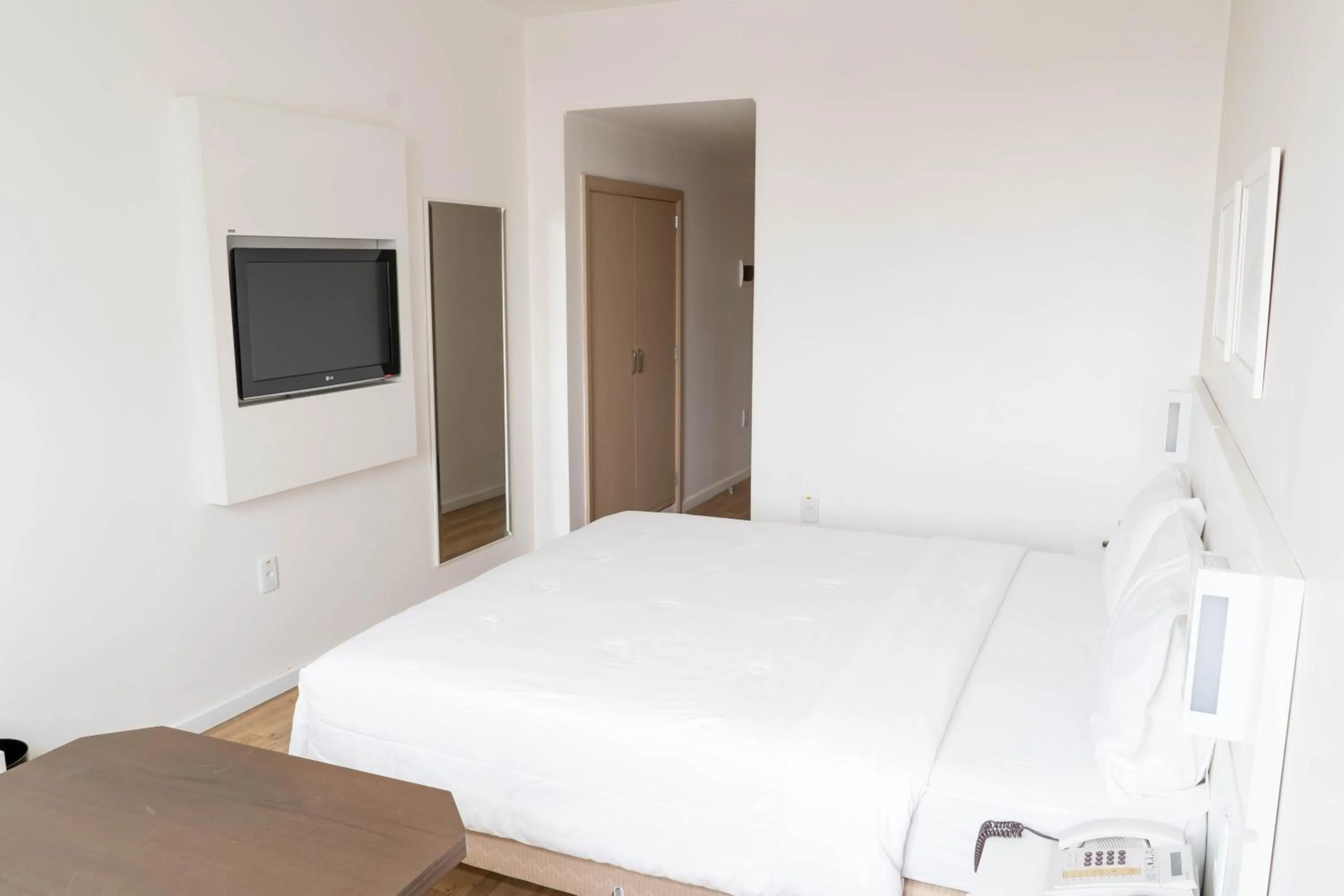 Bed in Plaza São Rafael Hotel