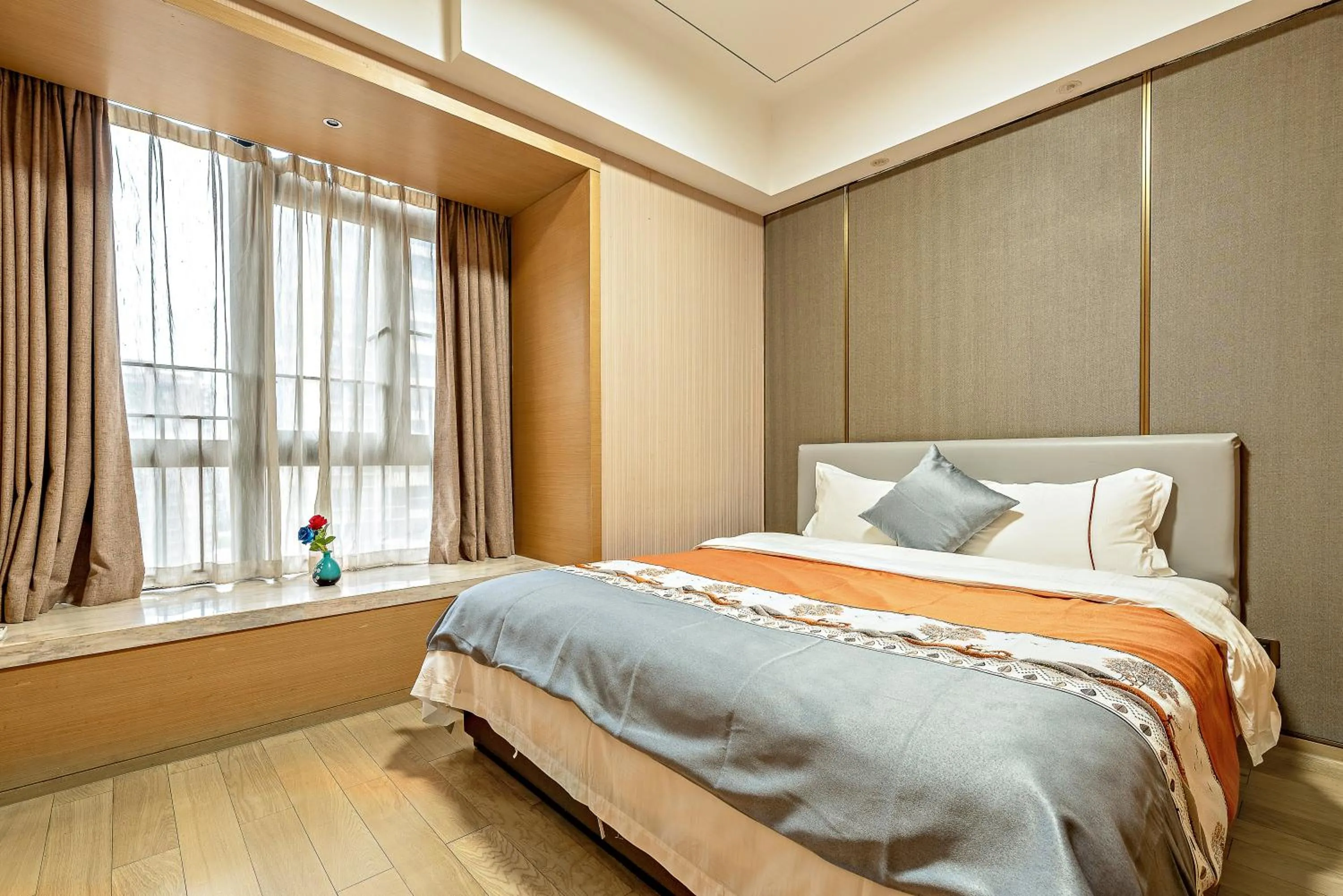 Two-Bedroom Apartment with Balcony in Kaifeisi International Hotel Apartment