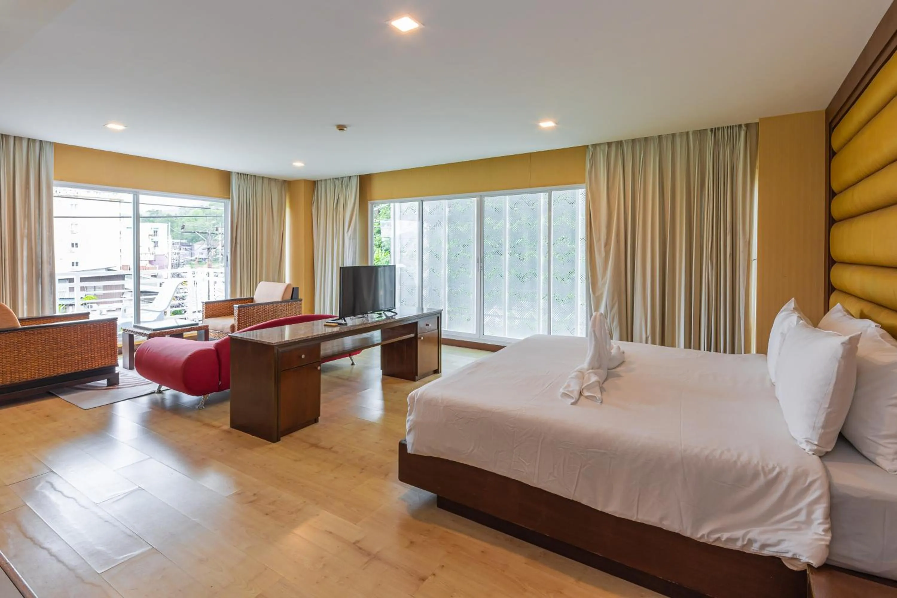 Bed in The Kris Resort Hotel