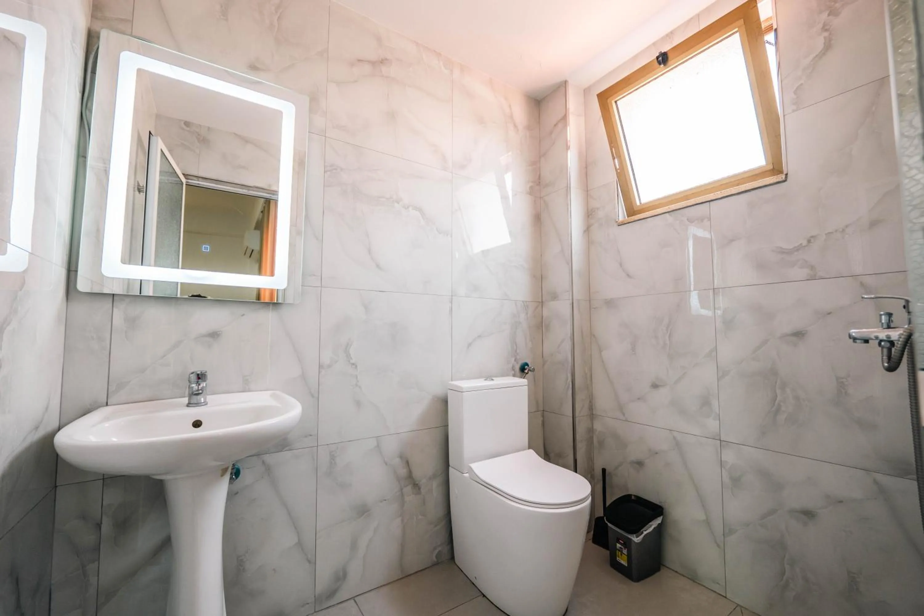 Toilet in KURTI Hotel