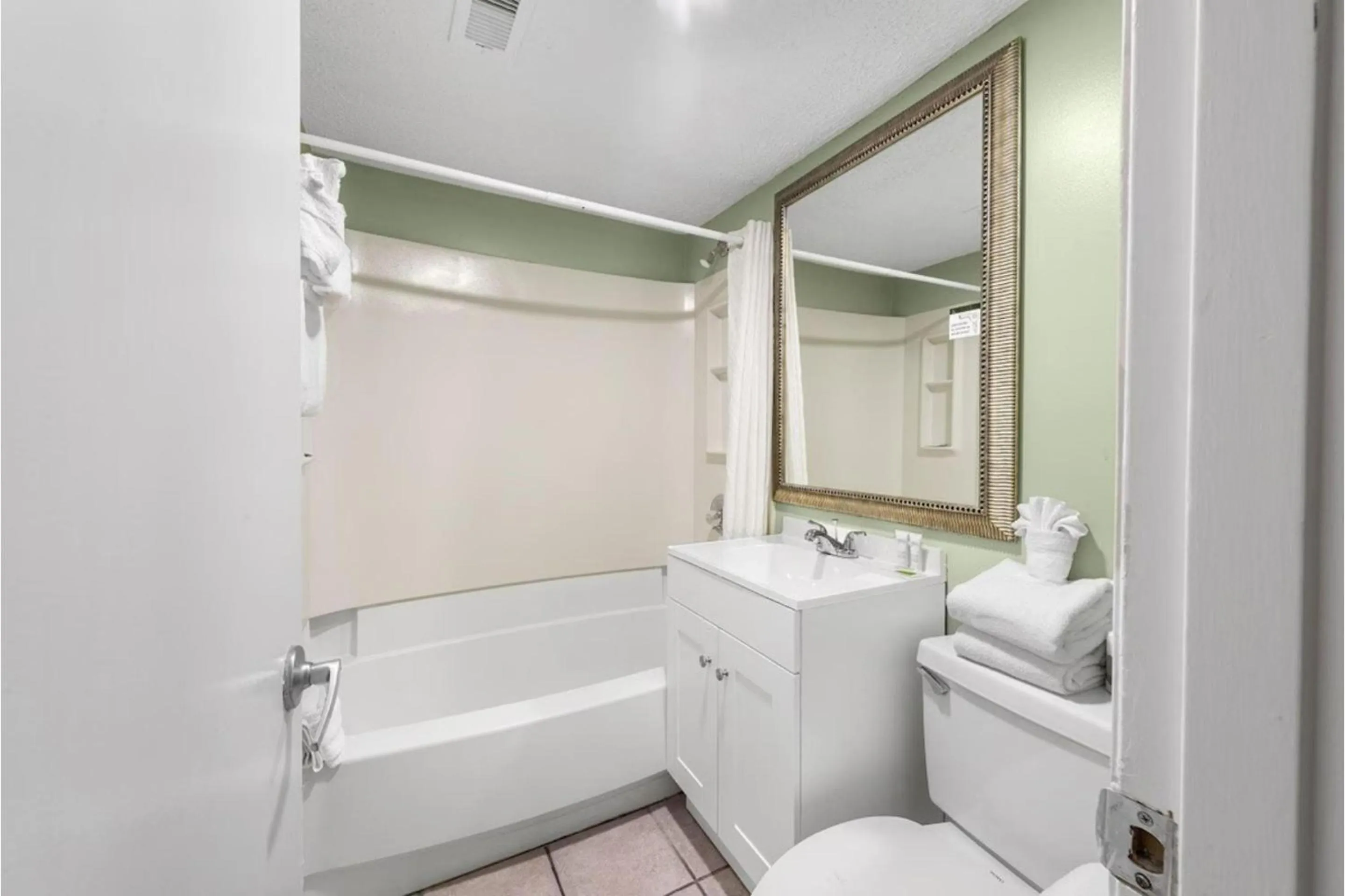 Bathroom in Capital O Sunset Waves