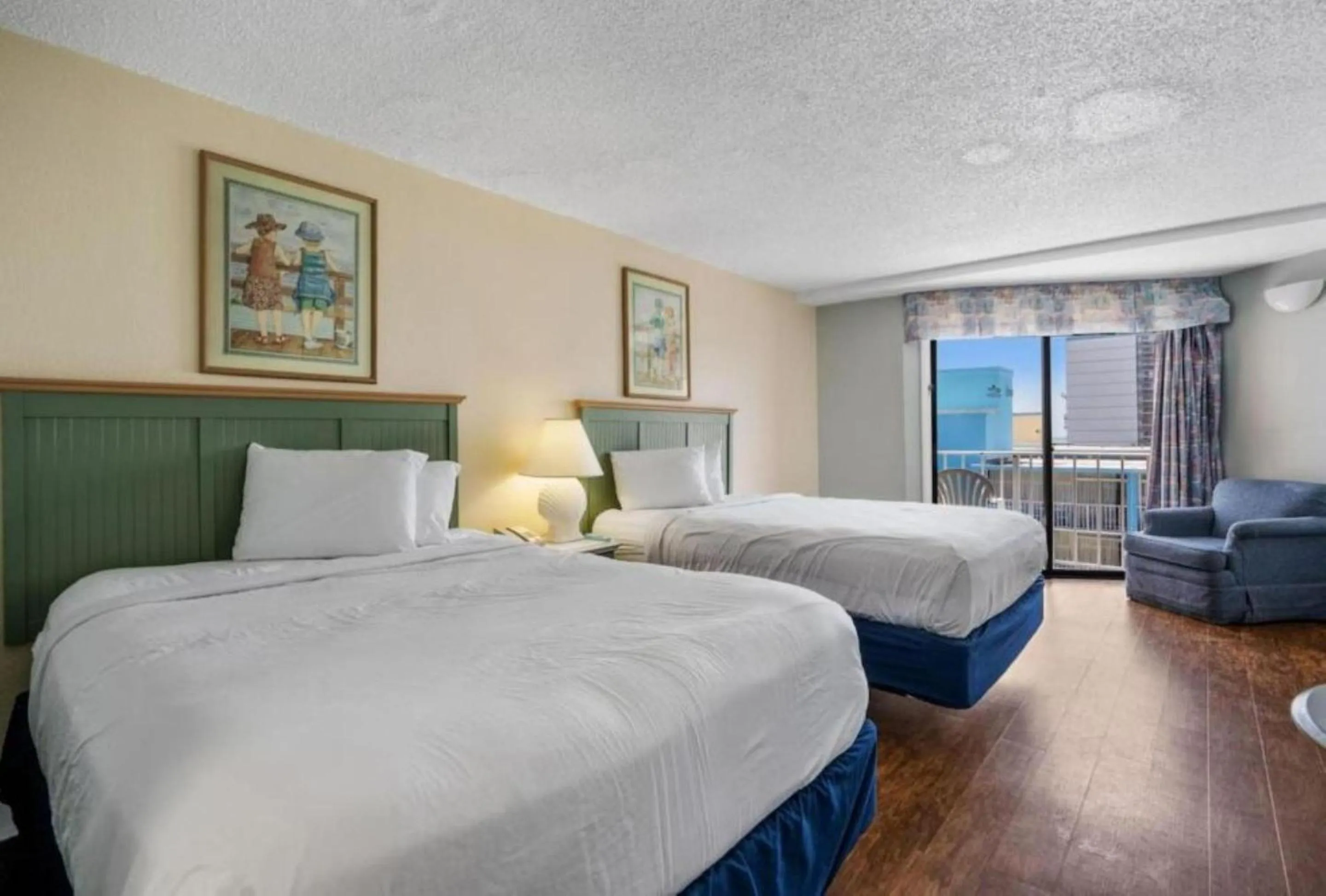 Bedroom in Capital O Sunset Waves