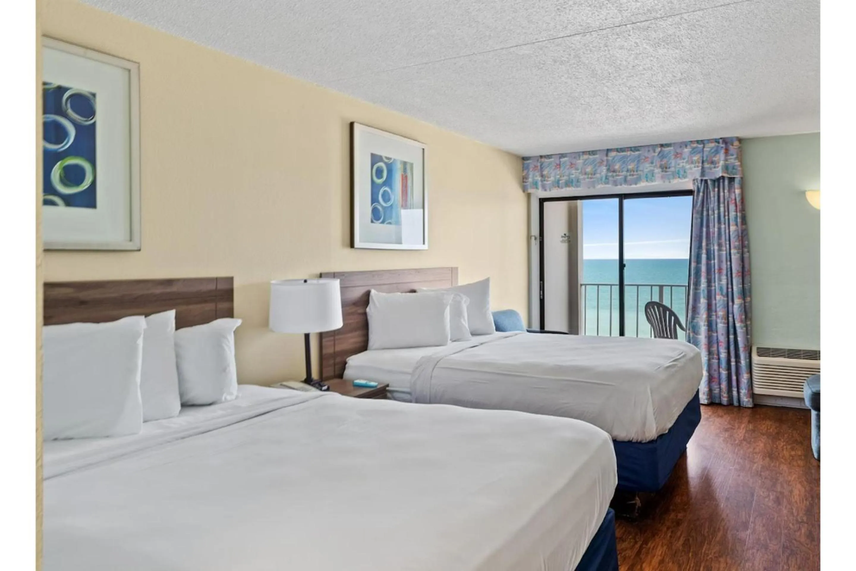 Bedroom in Capital O Sunset Waves