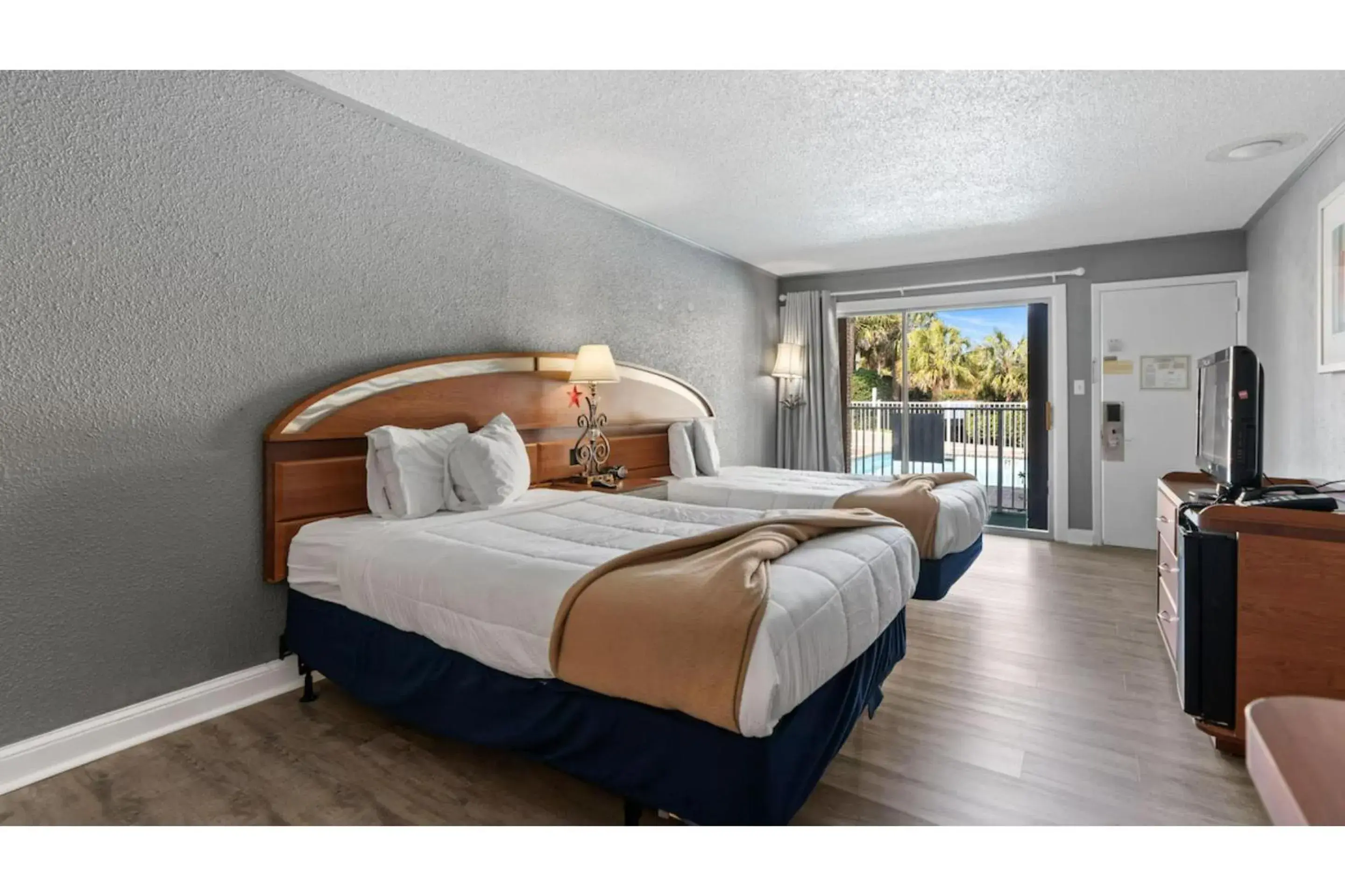 Bedroom in Capital O Sunset Waves Bedroom in Capital O Sunset Waves