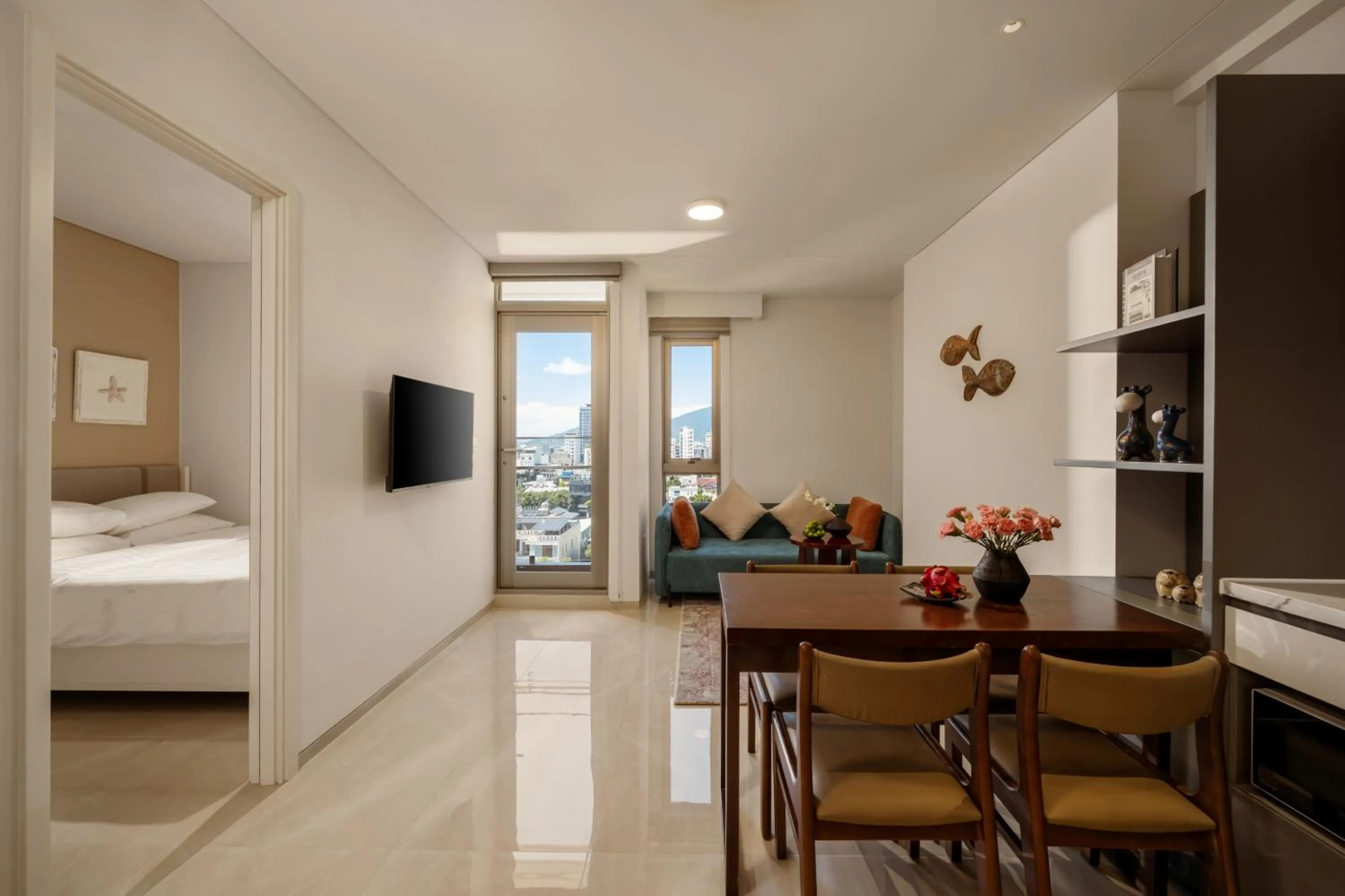 Communal lounge/ TV room, Bed in Amber Bay Hotel & Suites Da Nang