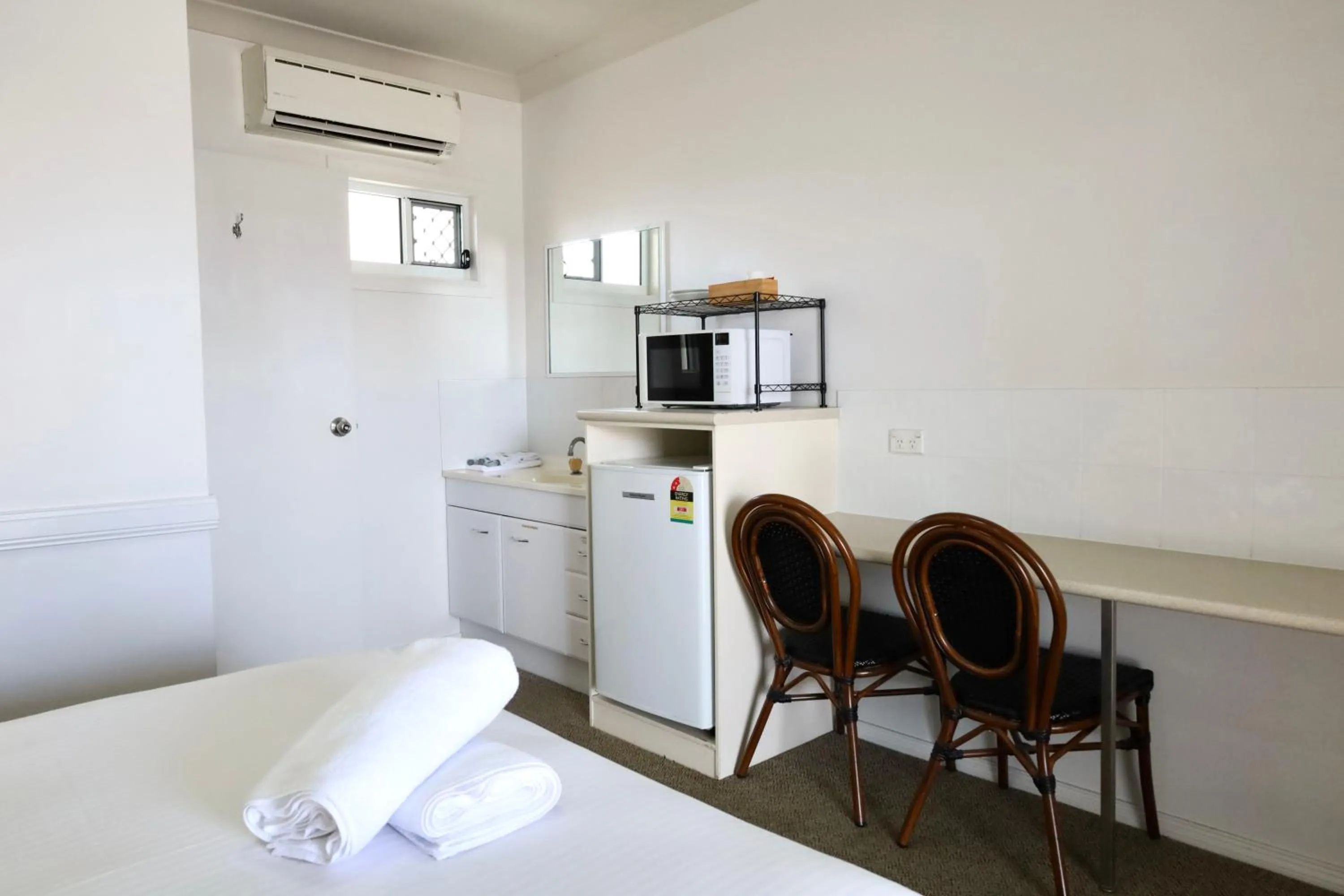 Bed in Park Avenue Hotel Motel