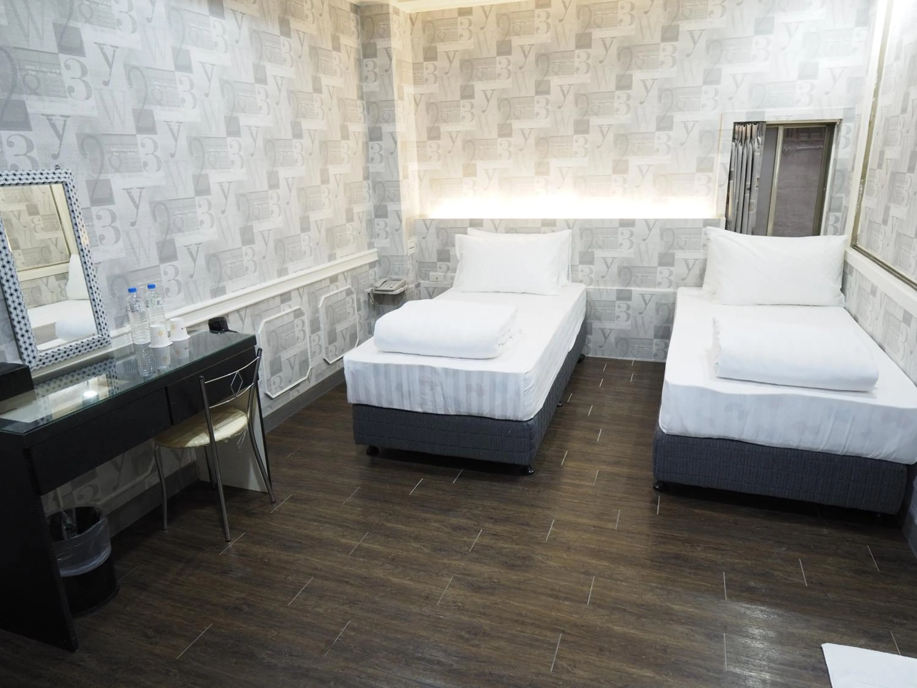 Bed in 合悅都會商旅 Heyue HOTEL