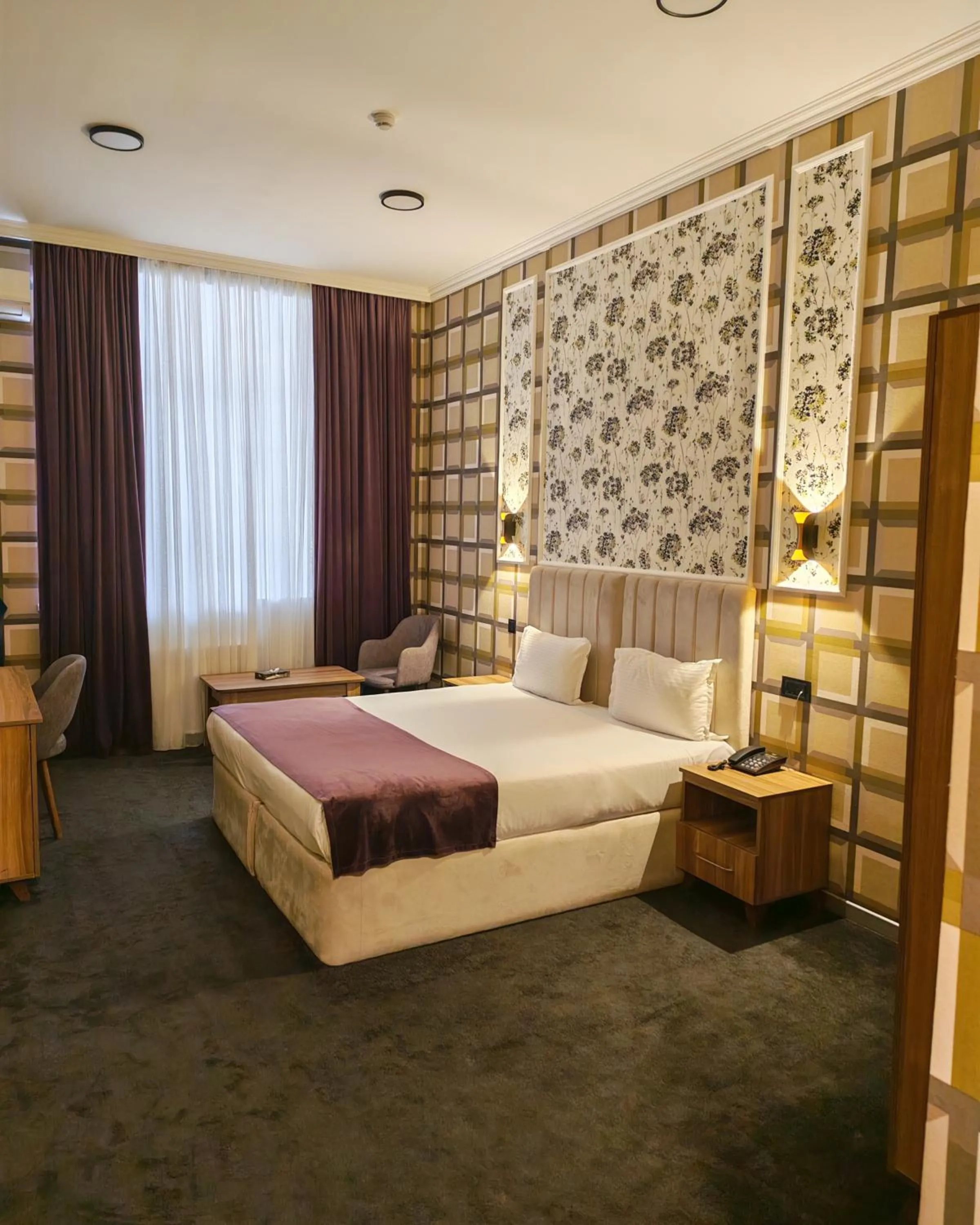 Living room, Bed in Will Hotel Baku