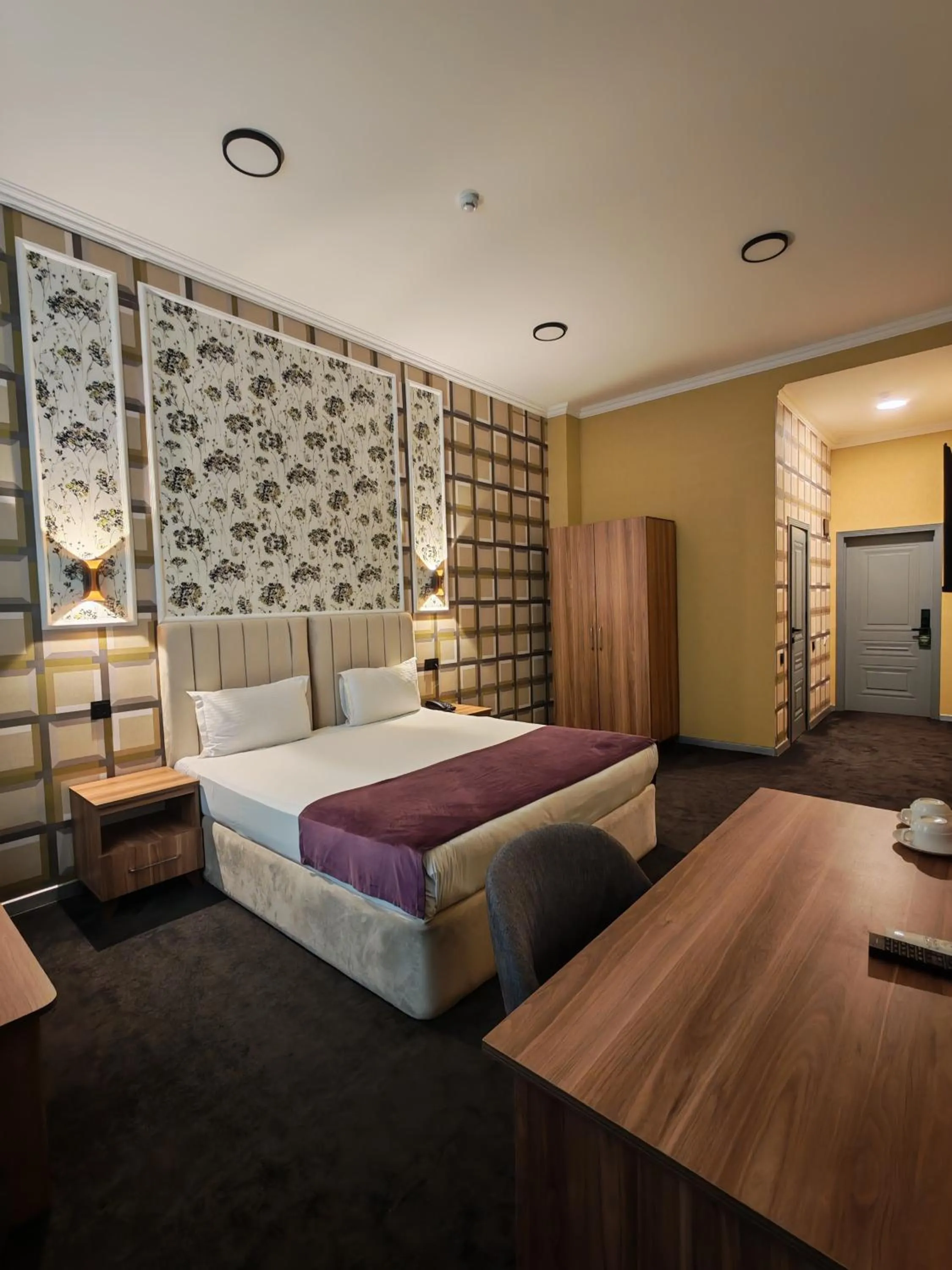 Living room, Bed in Will Hotel Baku