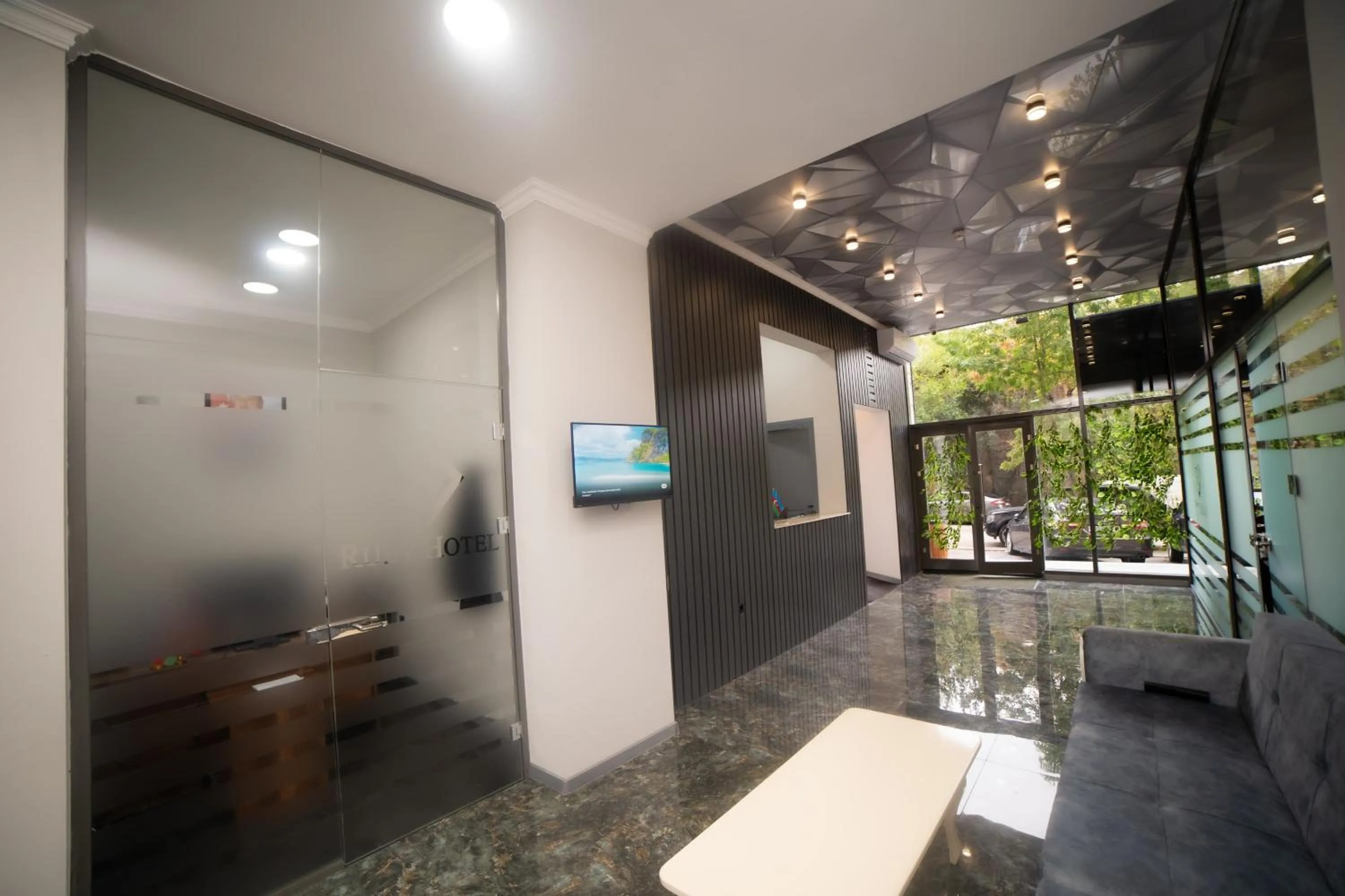 Communal lounge/ TV room in Will Hotel Baku