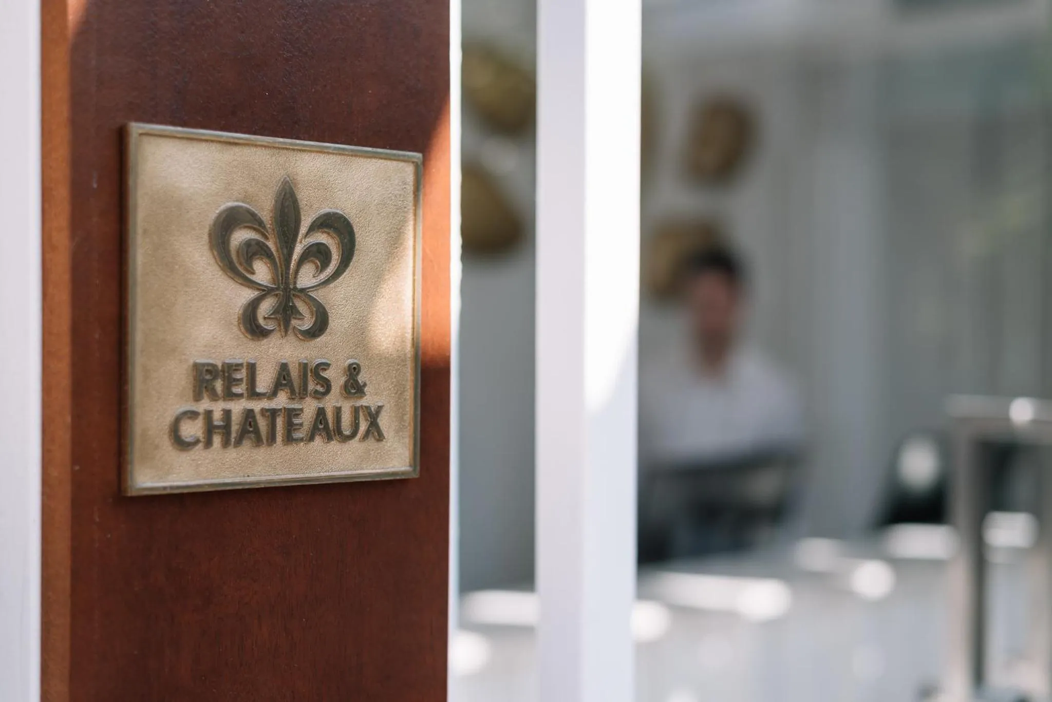 Property logo or sign in Avaton Luxury Beach Resort - Relais & Chateaux