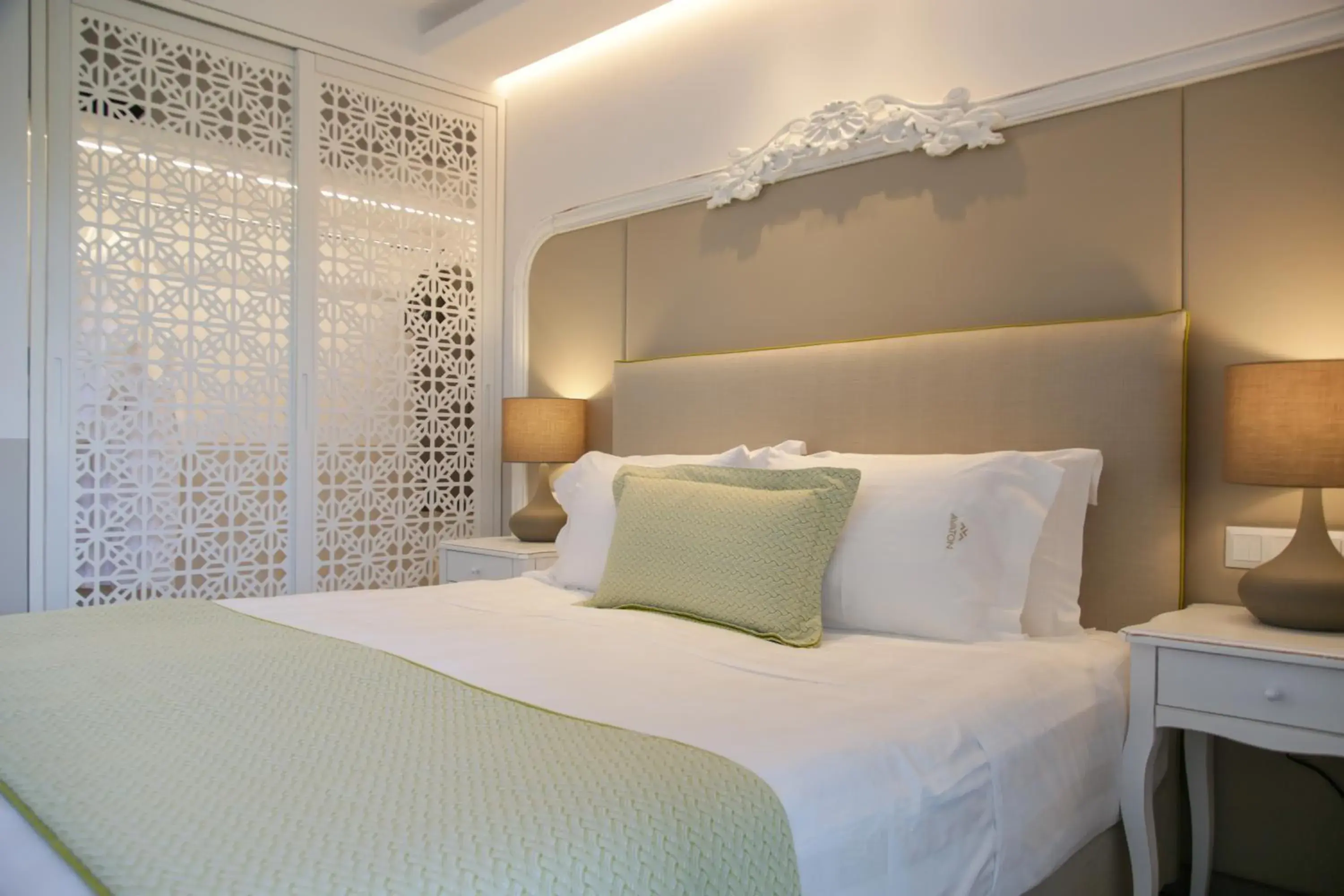 Bedroom in Avaton Luxury Beach Resort - Relais & Chateaux Bedroom in Avaton Luxury Beach Resort - Relais & Chateaux