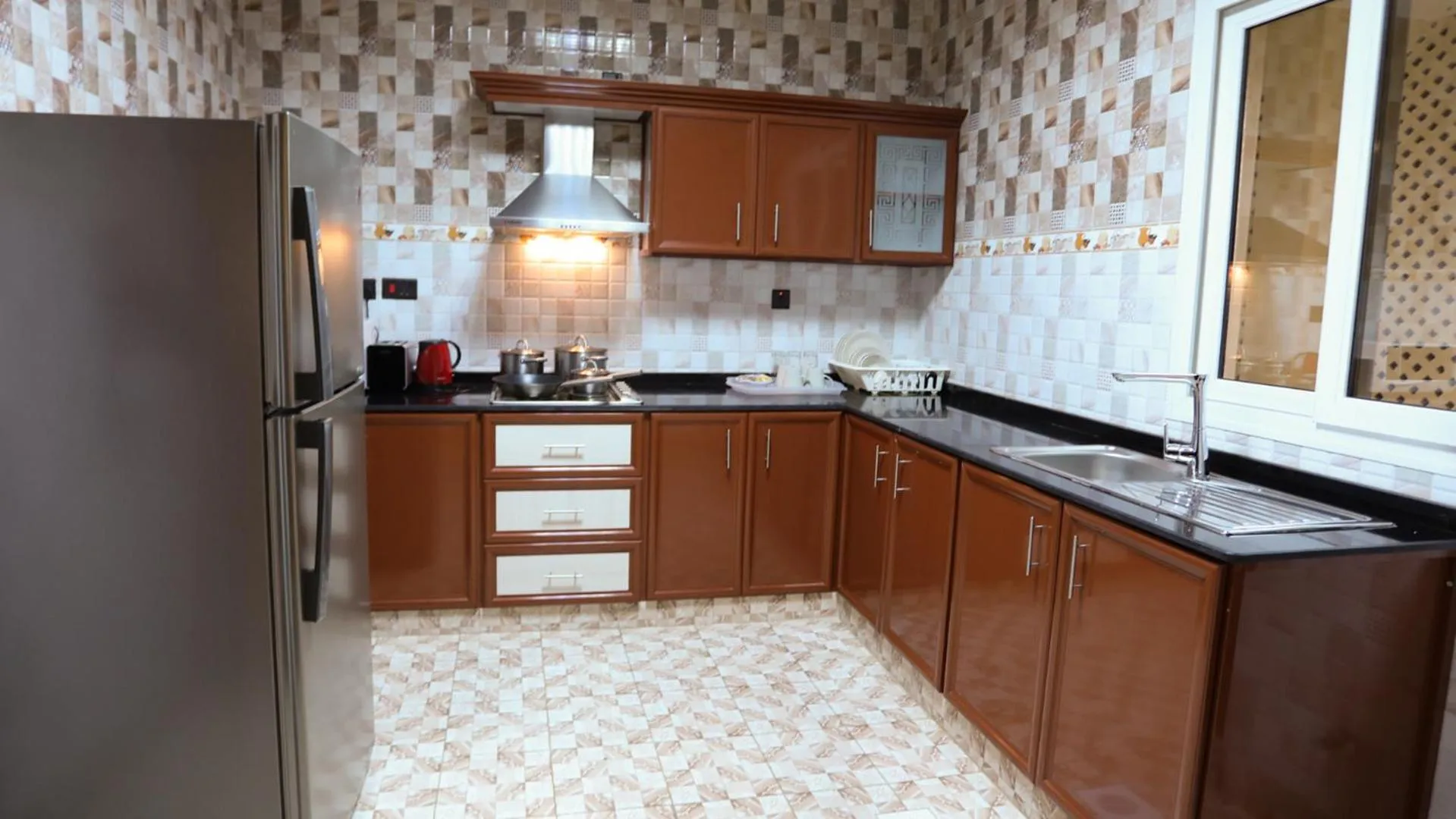 Kitchen or kitchenette in Remas Hotel Suites - Al Khoudh, Seeb, Muscat